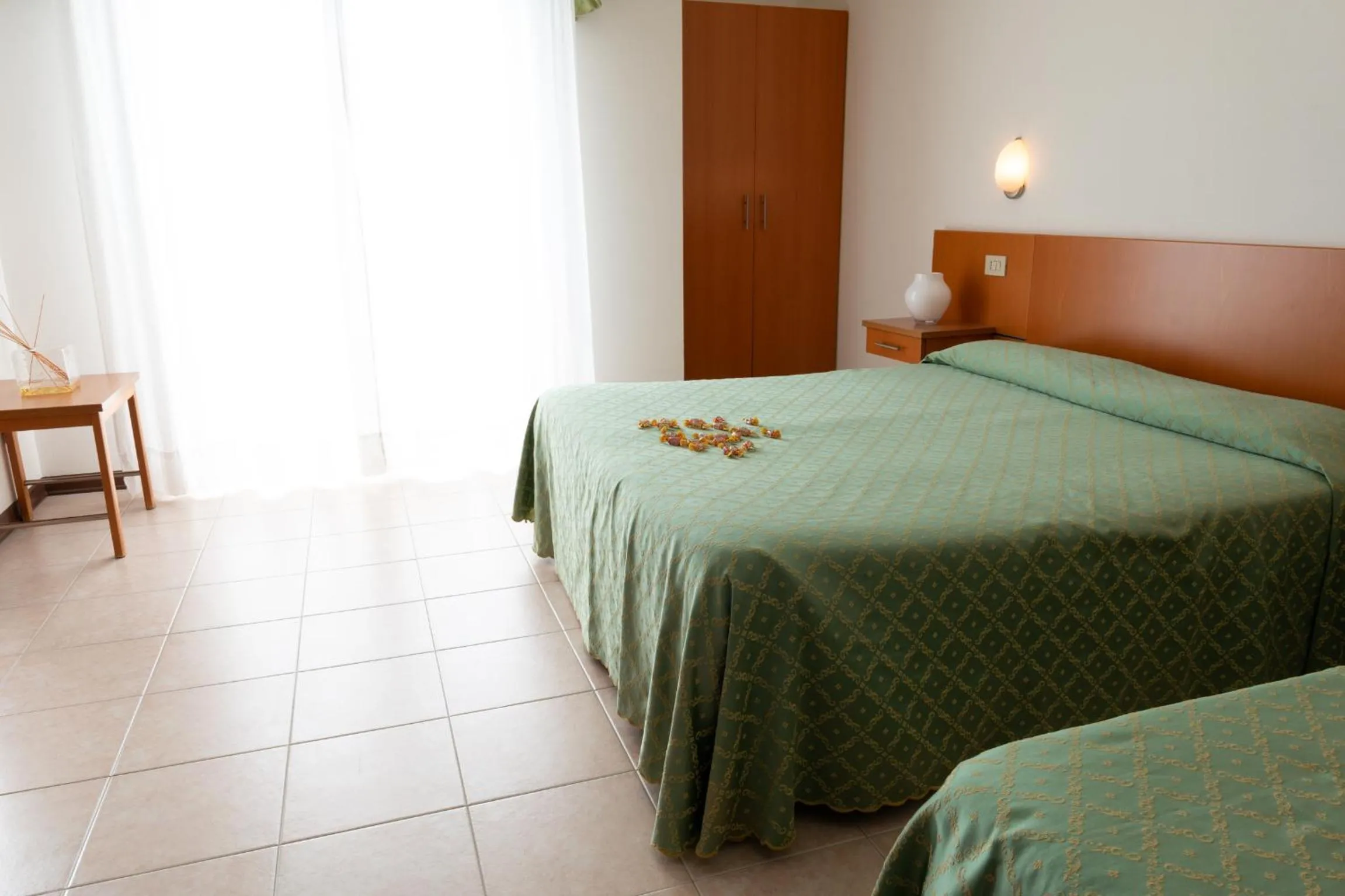 Bed in Hotel Nettuno