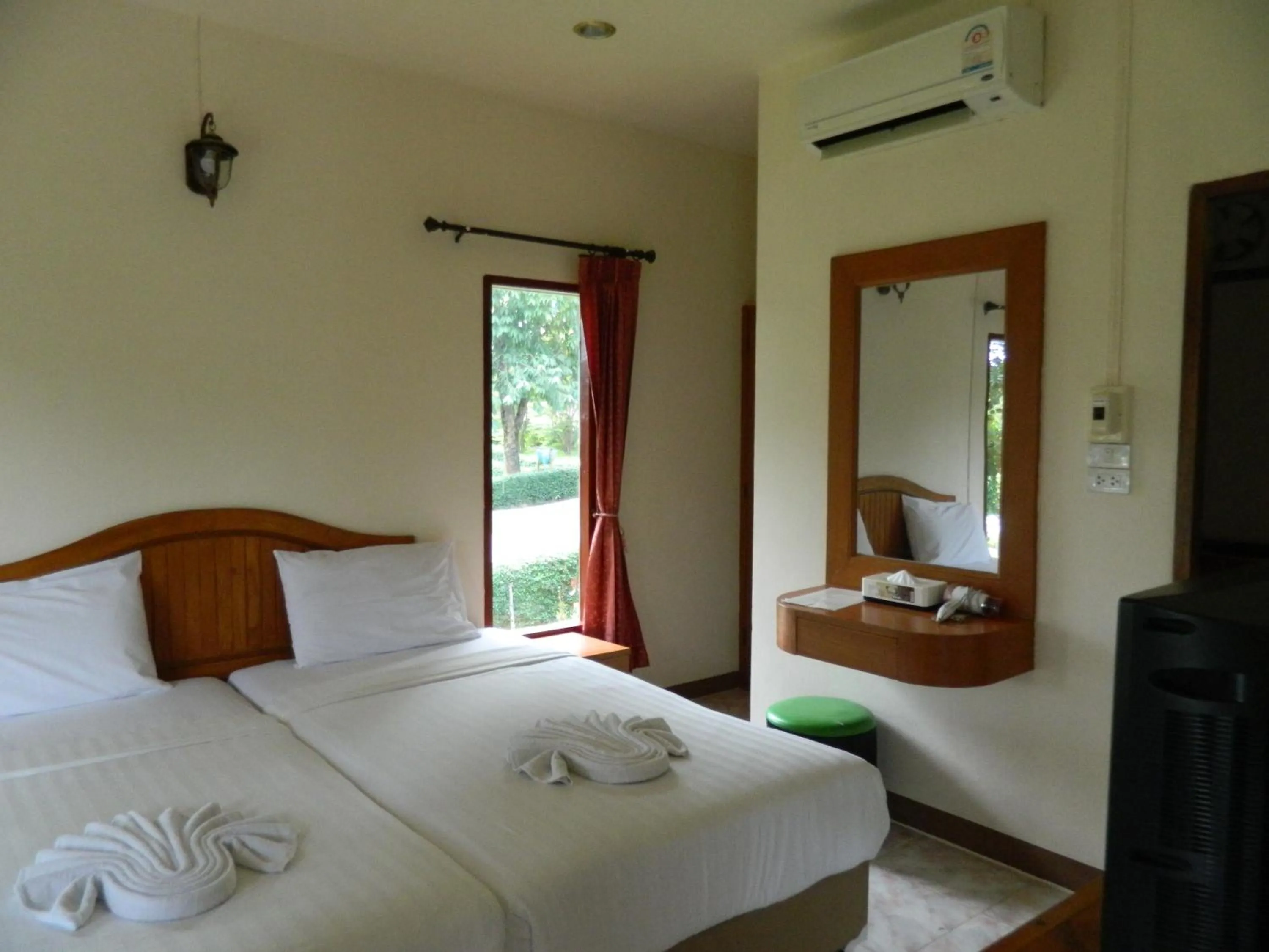 Bed in Pai Iyara Resort