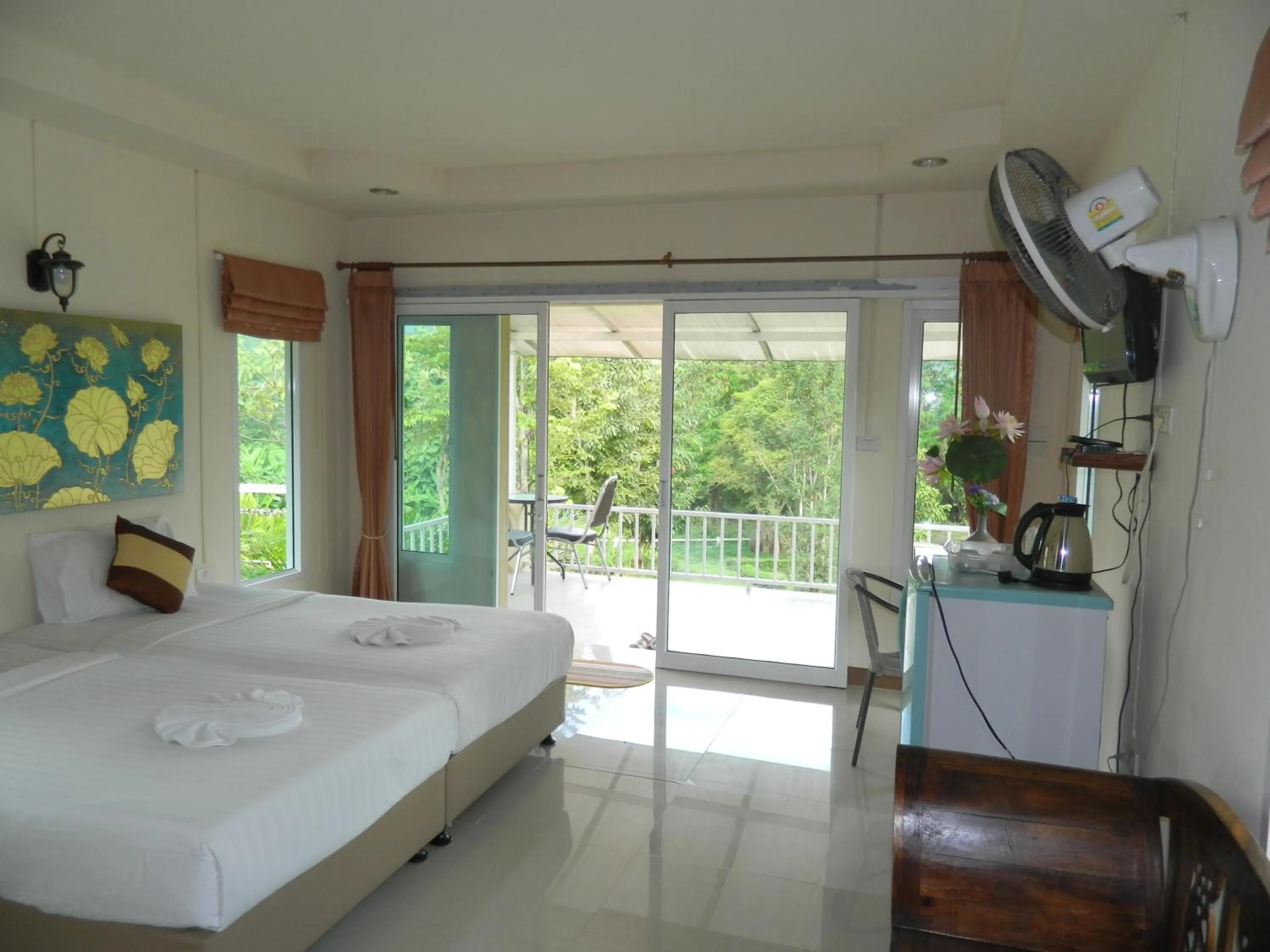 Bed in Pai Iyara Resort