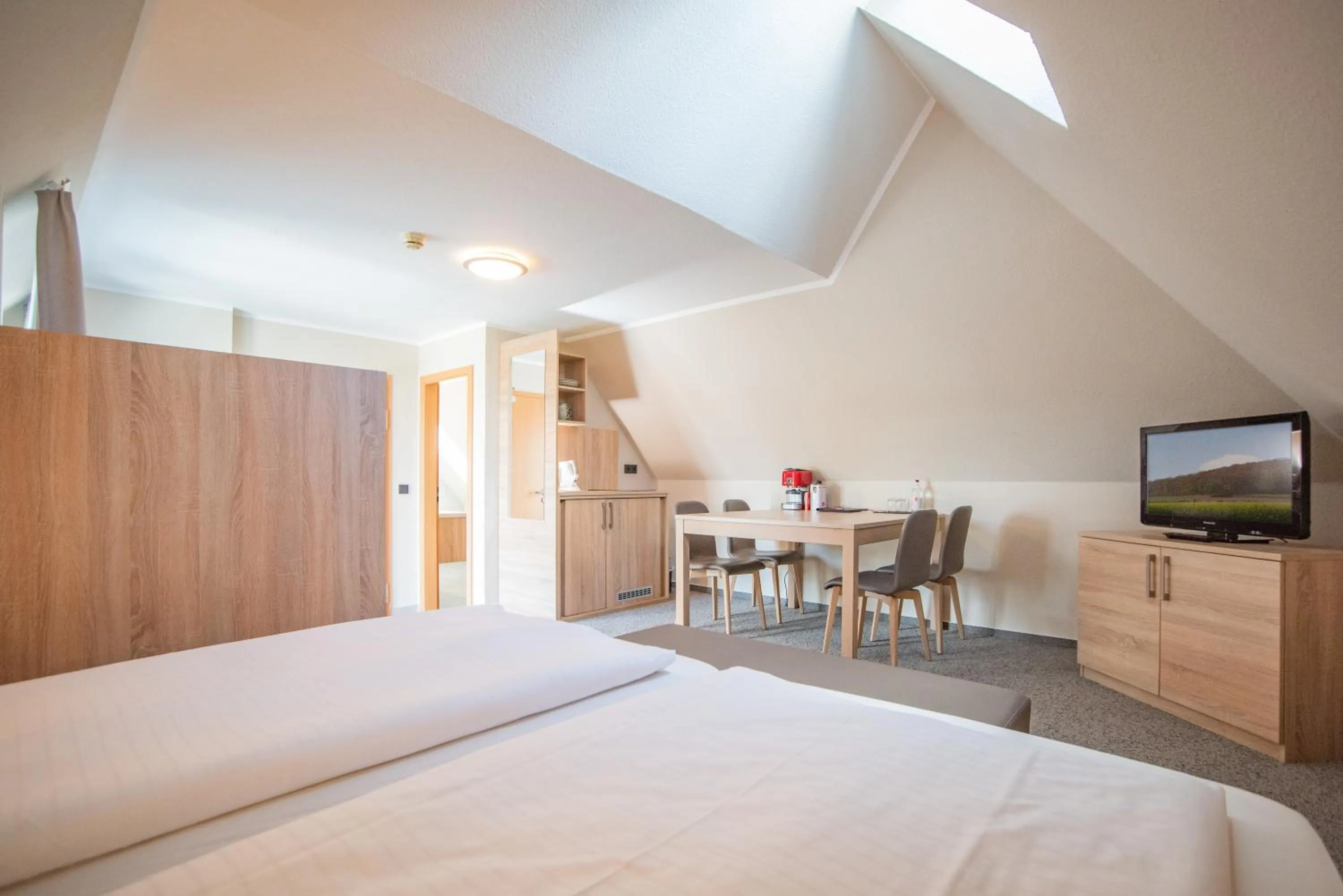 Photo of the whole room, Bed in Hotel Hollmann