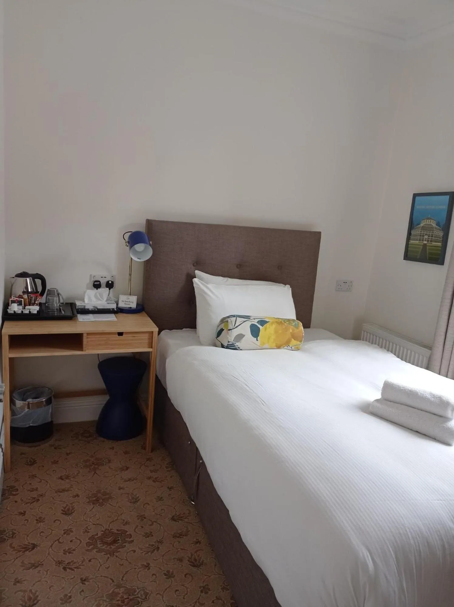 Bed in Tom Dick and Harriet's Accommodation