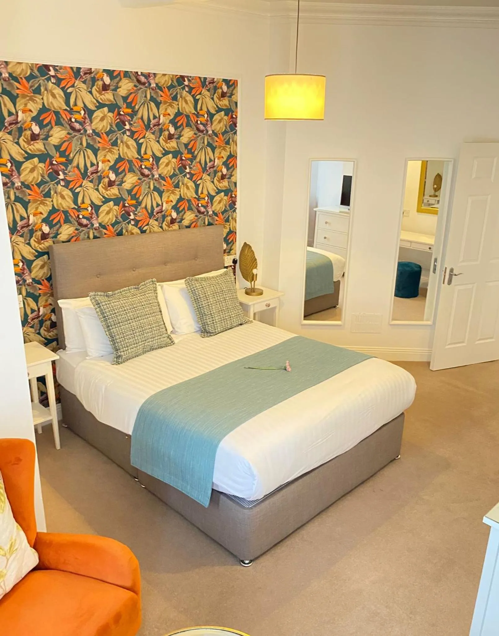 Bed in Tom Dick and Harriet's Accommodation