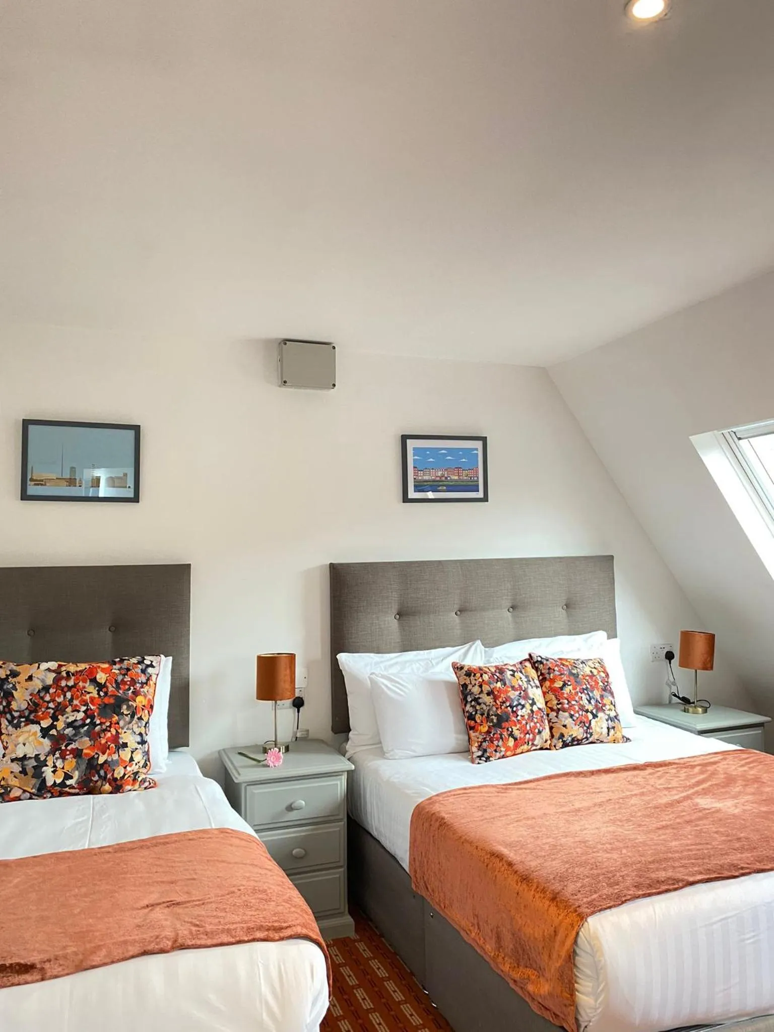 Bed in Tom Dick and Harriet's Accommodation