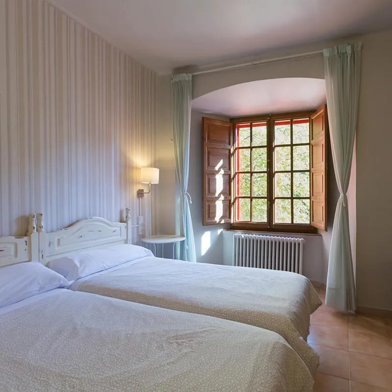 Bed in MONASTERIO de SANTA MARÍA DE VALVANERA