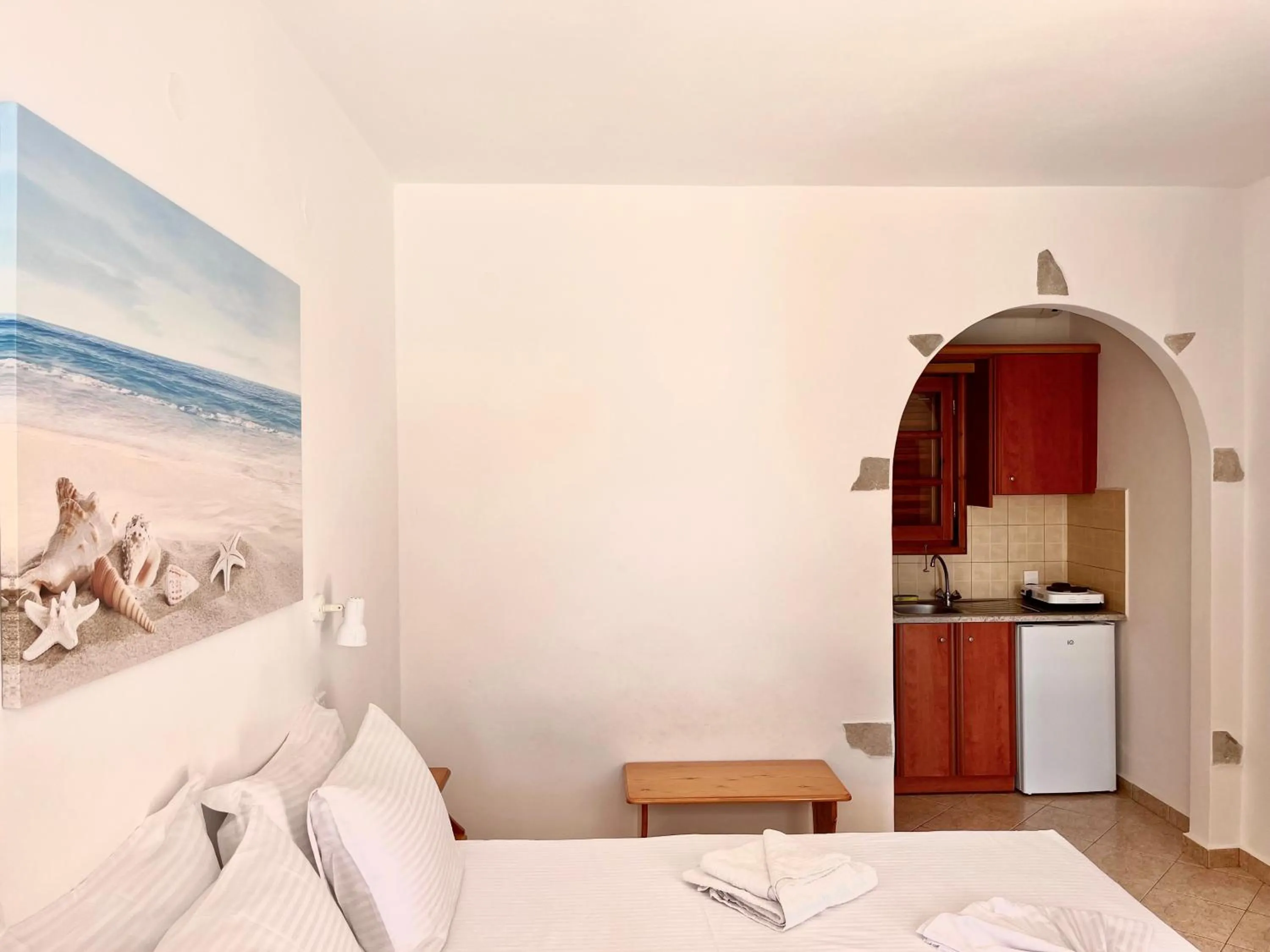 Photo of the whole room, Bed in Nicolas Studios