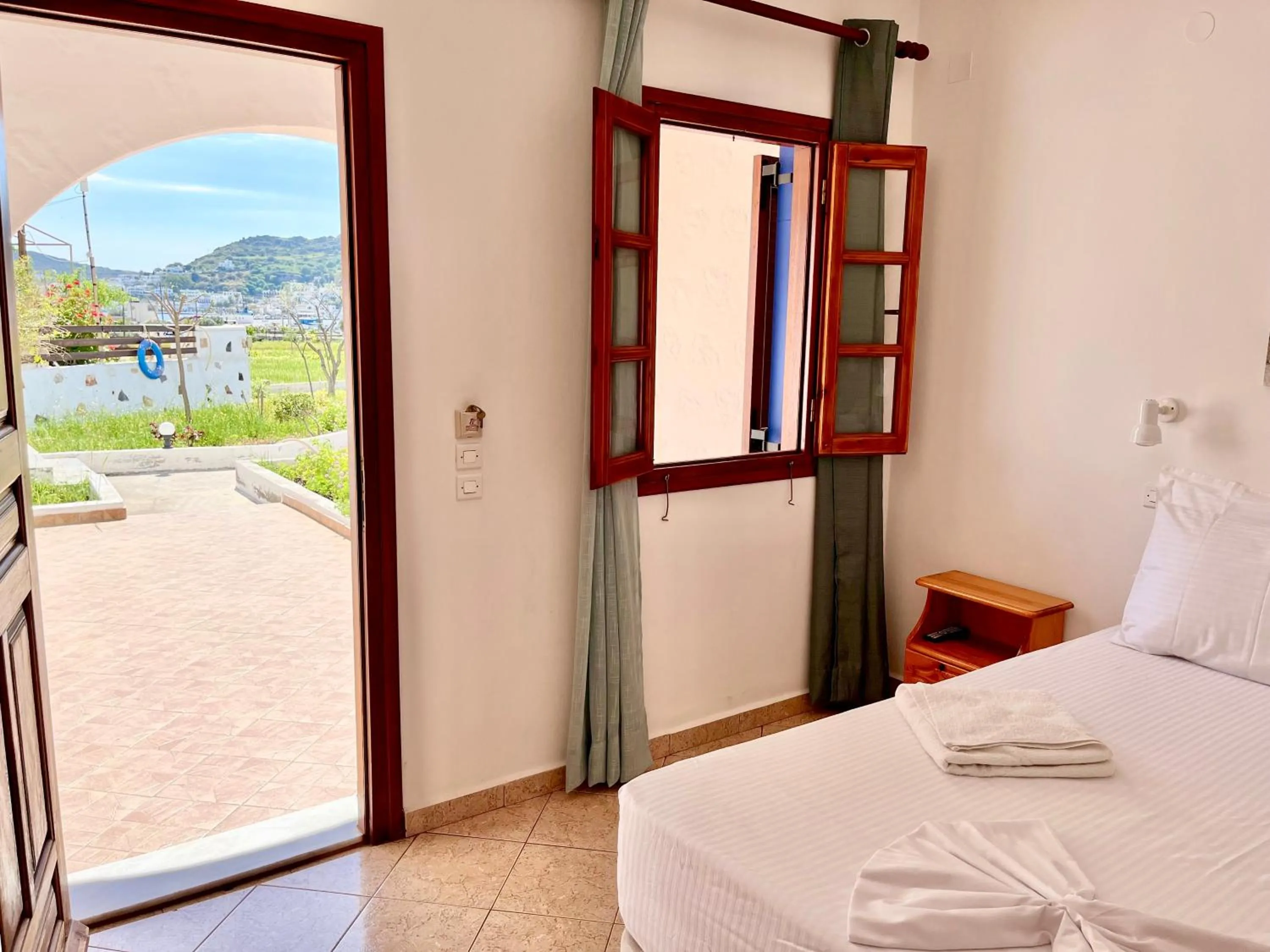 Photo of the whole room, Bed in Nicolas Studios