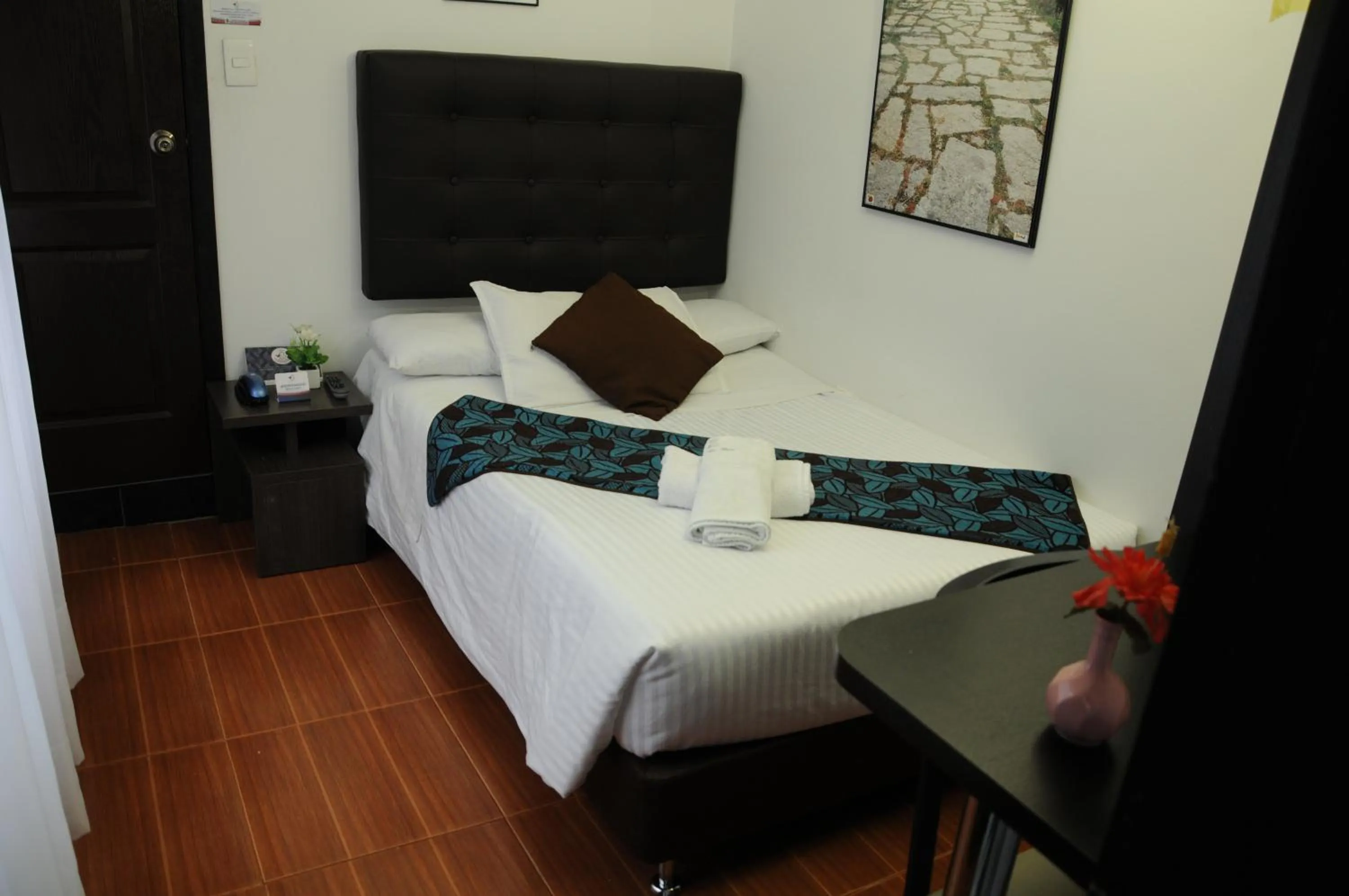 Bedroom, Bed in Hotel Central House a 5 min de la Embajada Americana