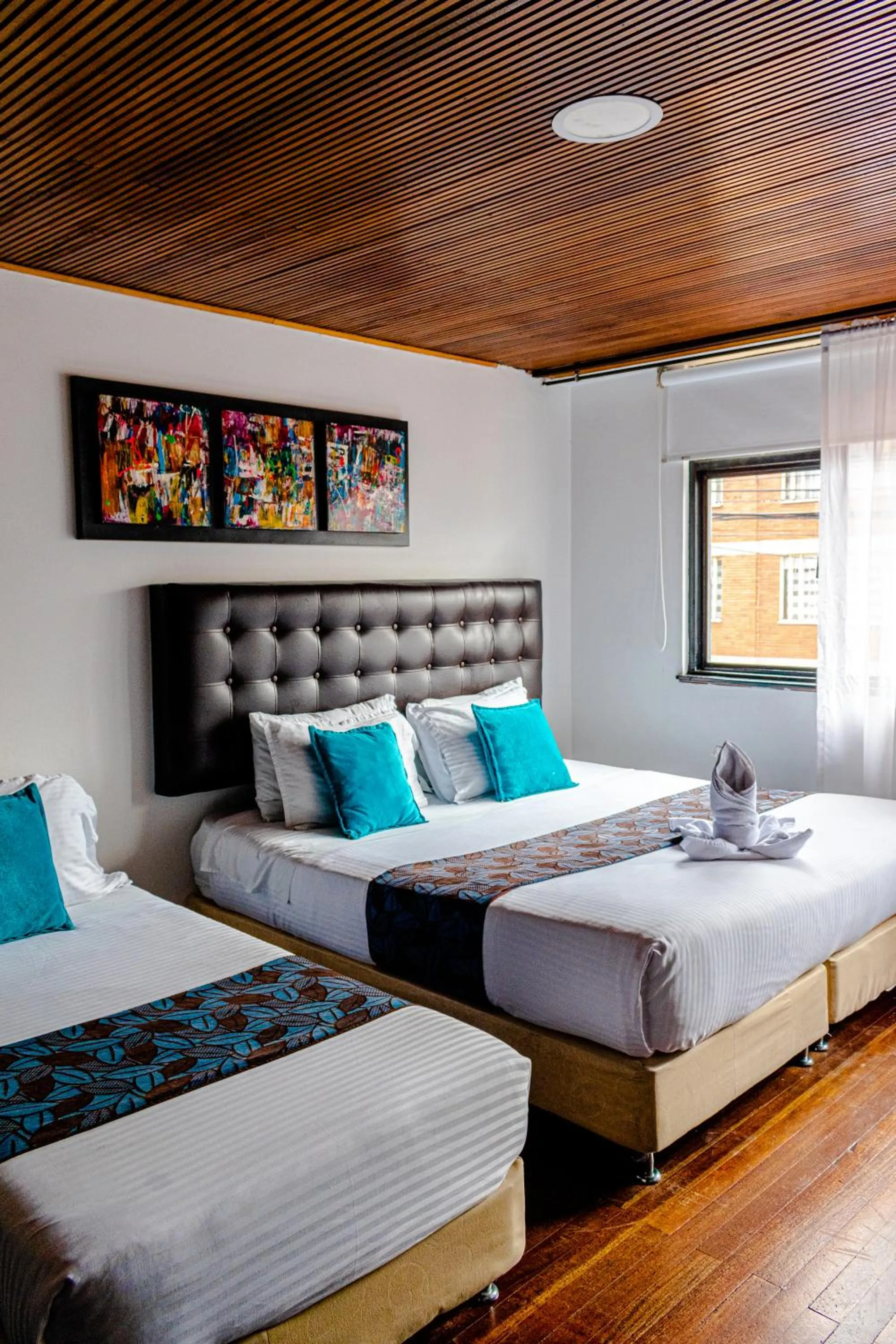 Photo of the whole room, Bed in Hotel Central House a 5 min de la Embajada Americana