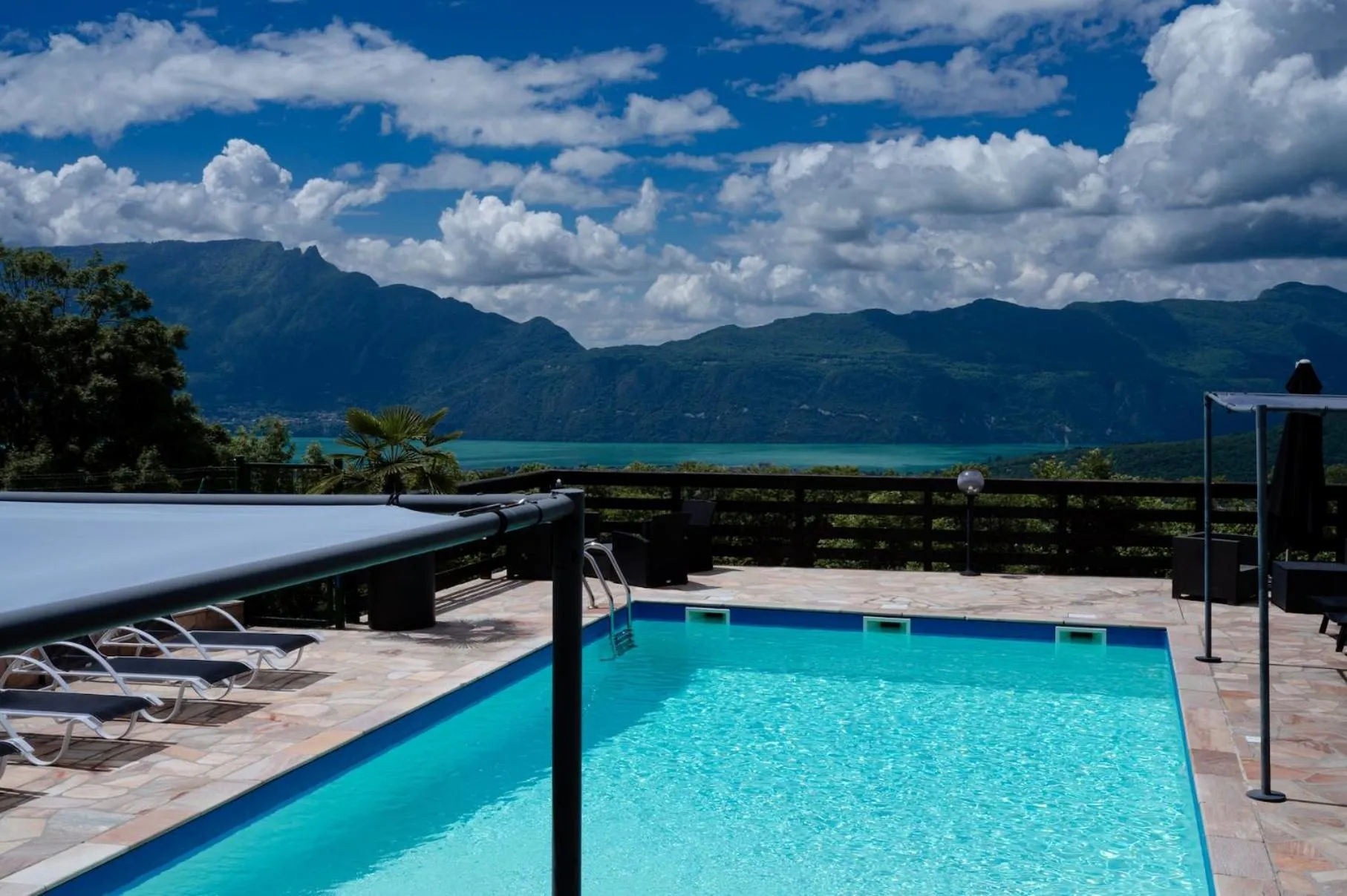 Swimming pool in Logis Hôtel Le Bellevue