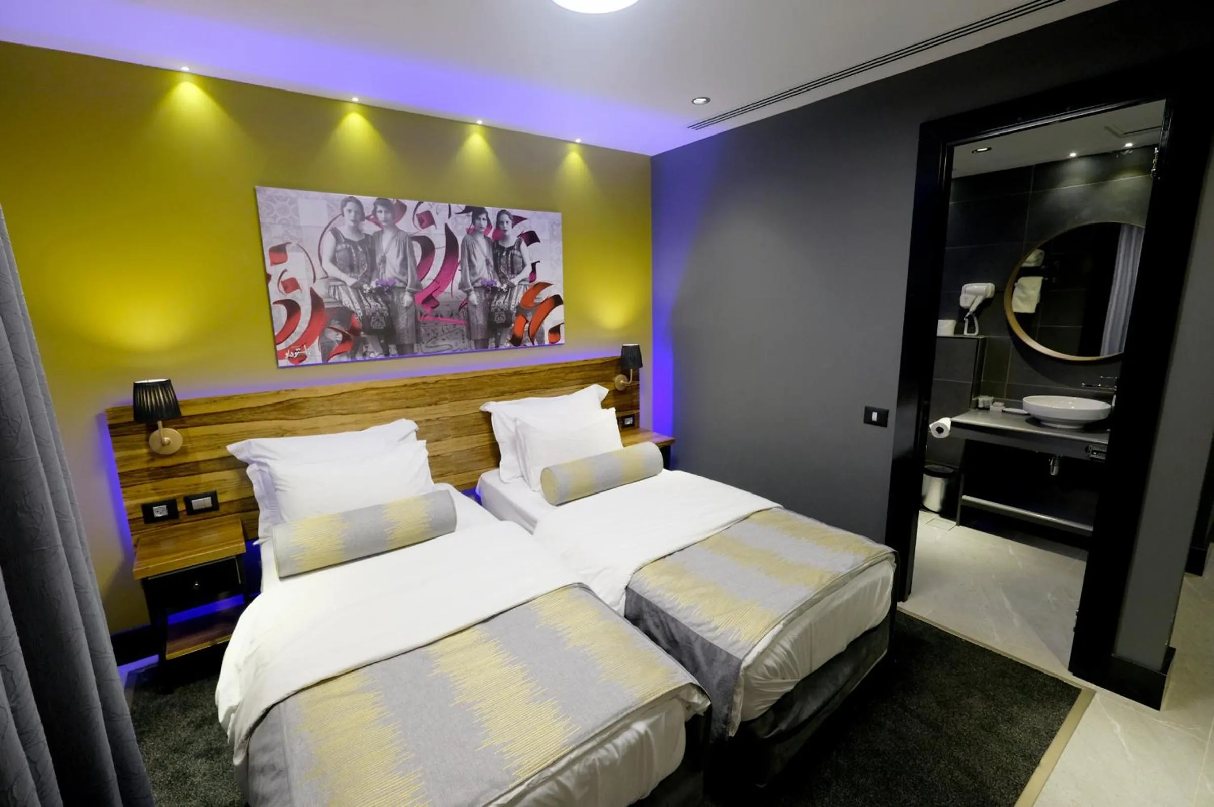 Bed in Royal Court Hotel