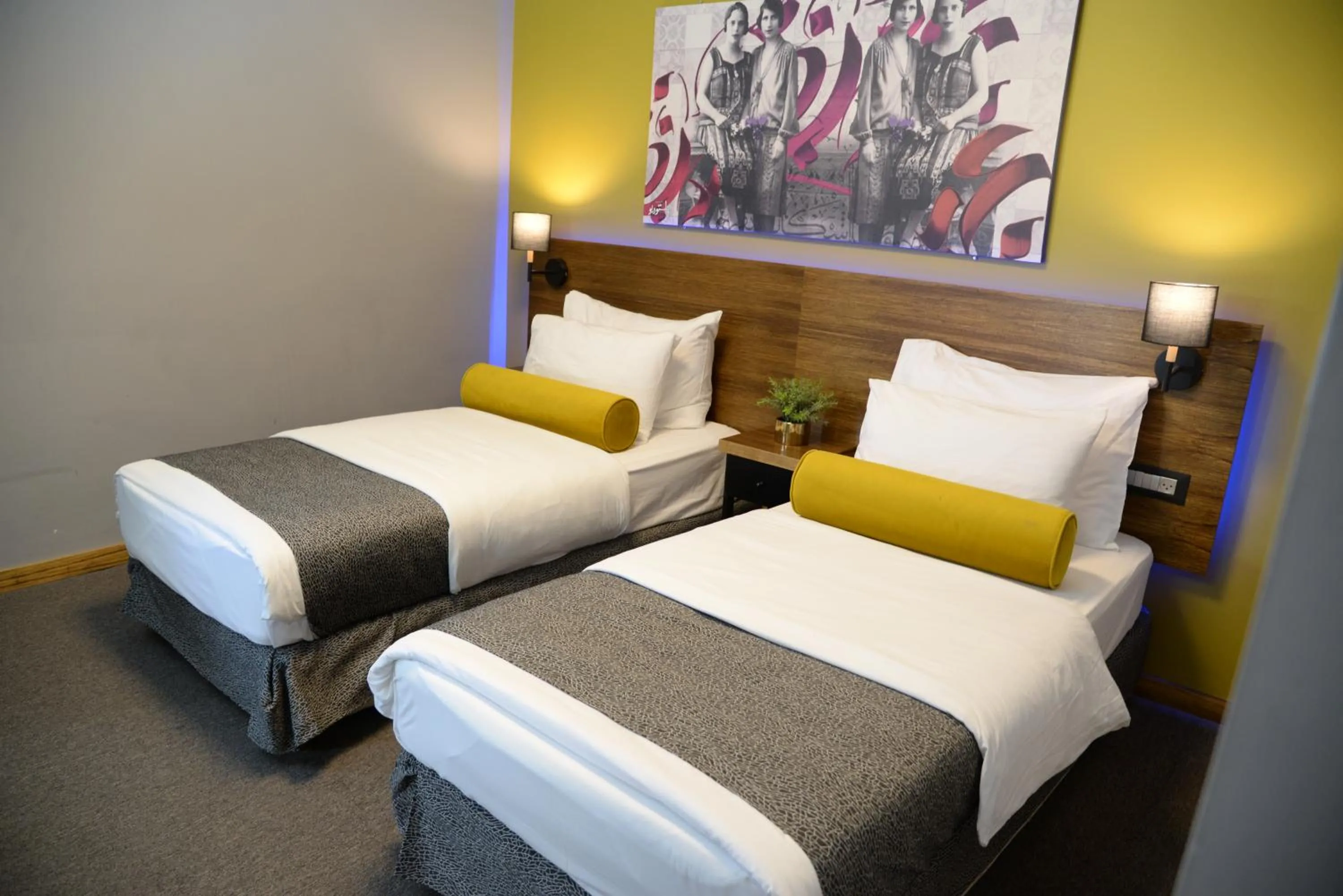 Bed in Royal Court Hotel