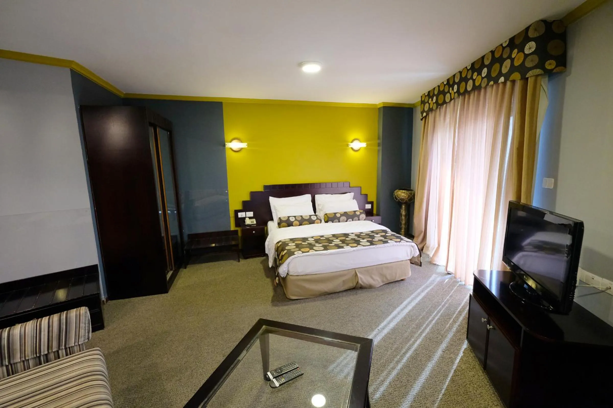 Bed in Royal Court Hotel