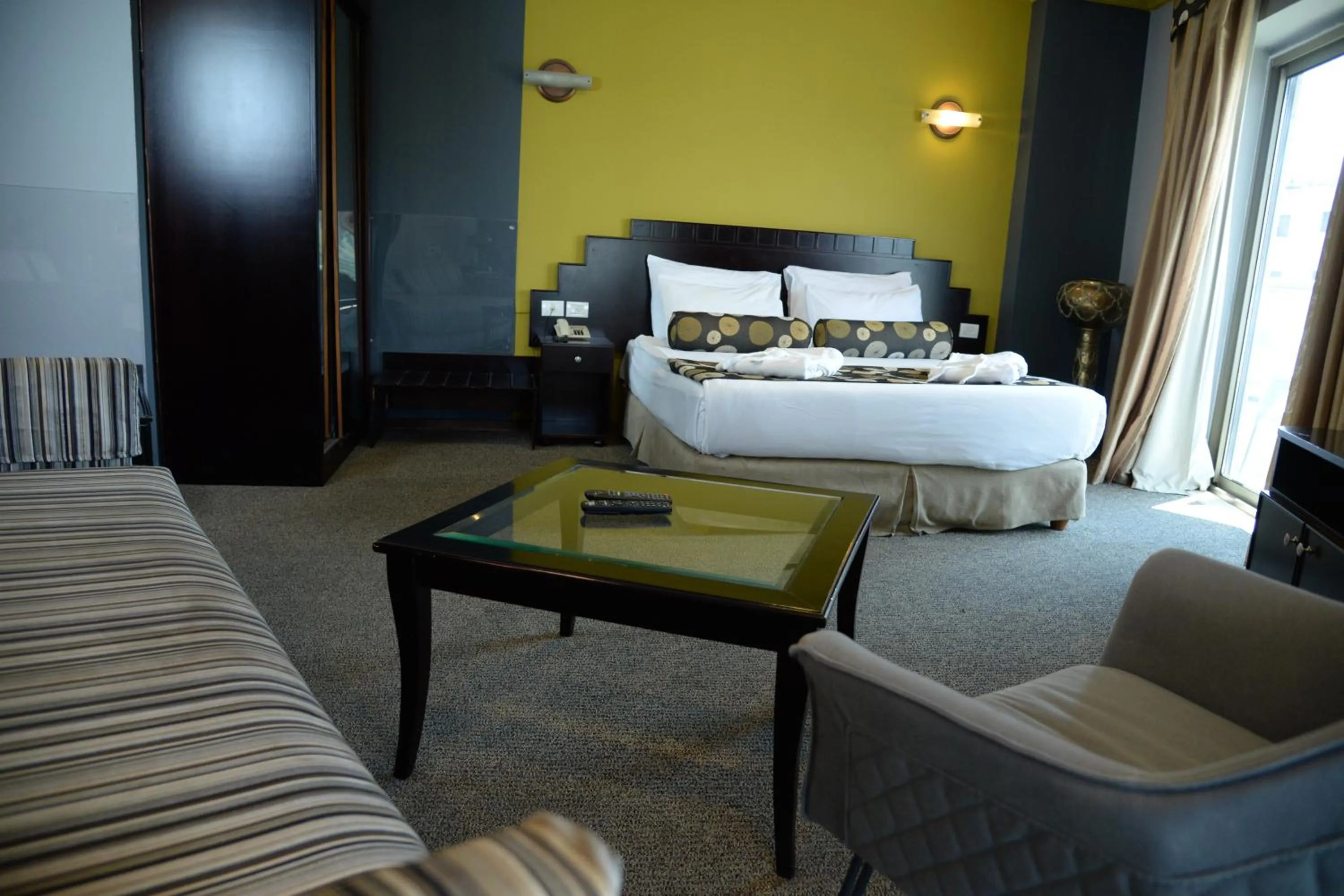 Bed in Royal Court Hotel
