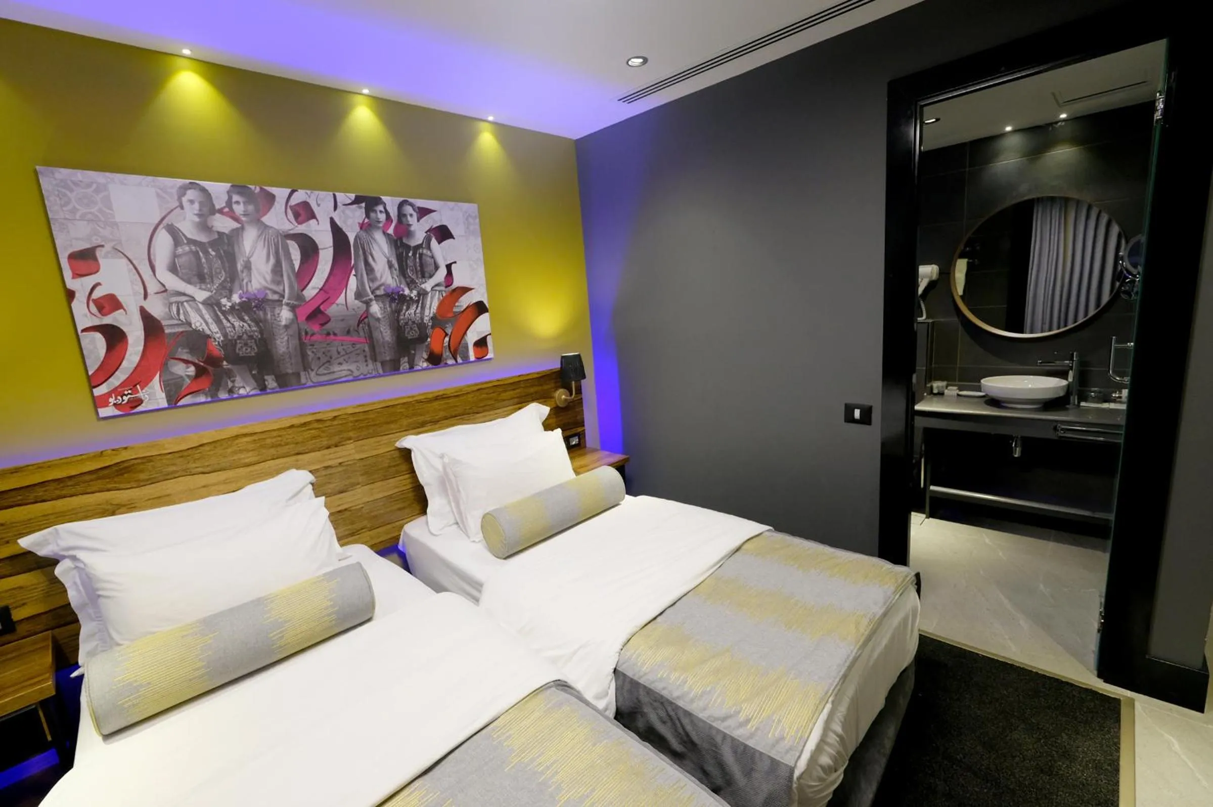 Bed in Royal Court Hotel