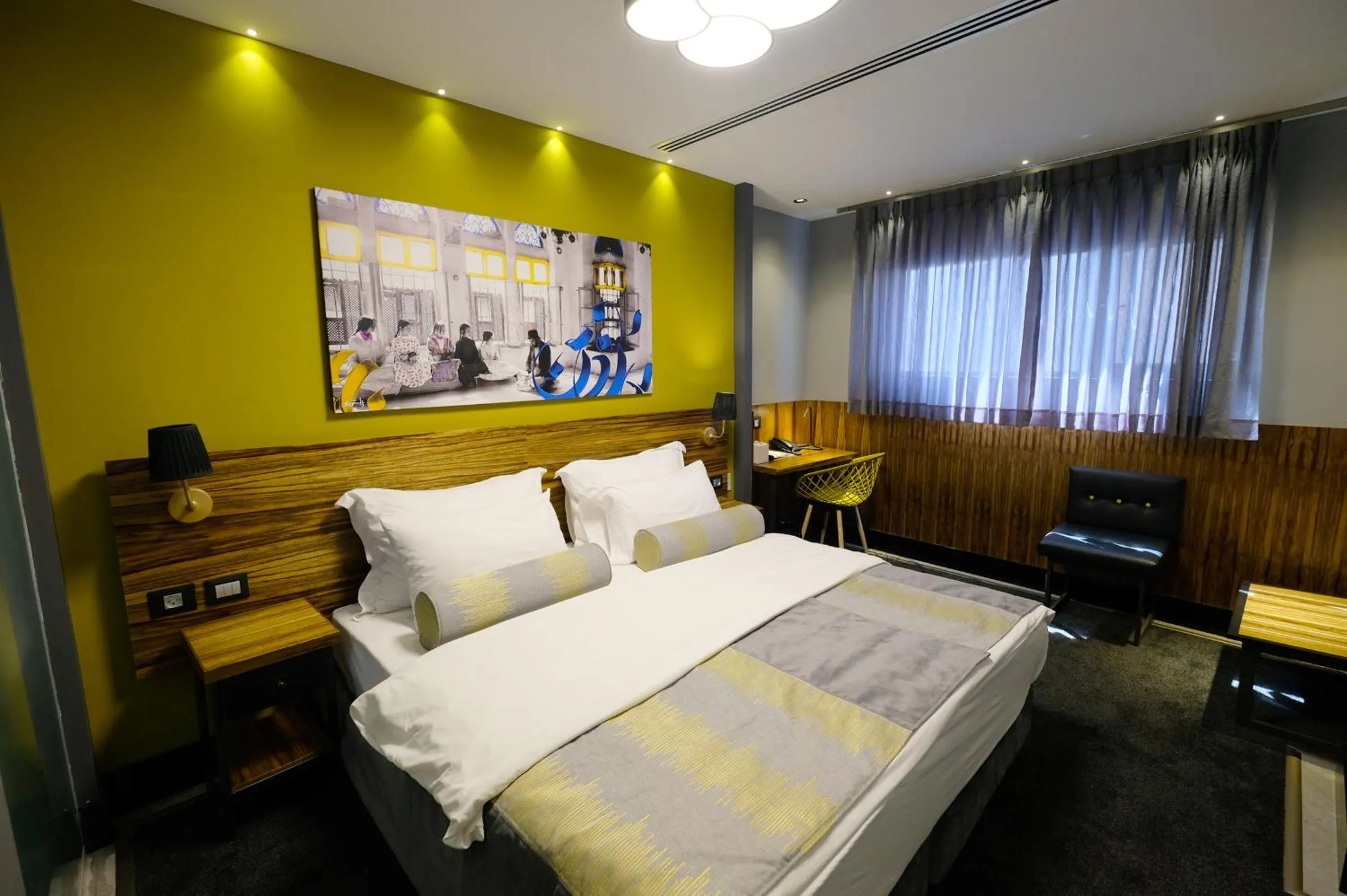Bed in Royal Court Hotel