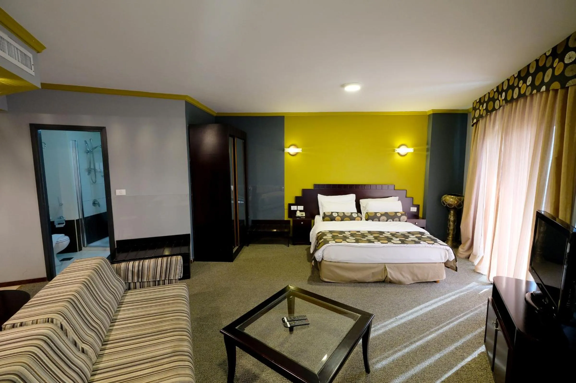Bed in Royal Court Hotel