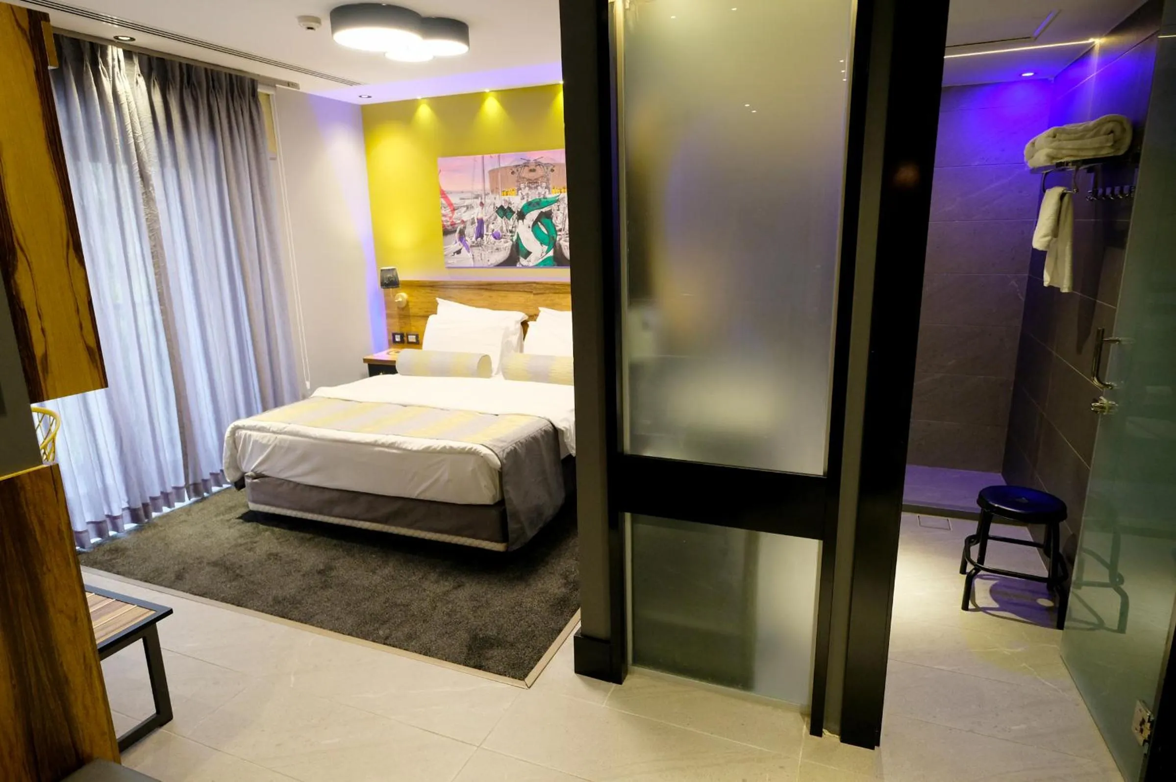 Bed in Royal Court Hotel
