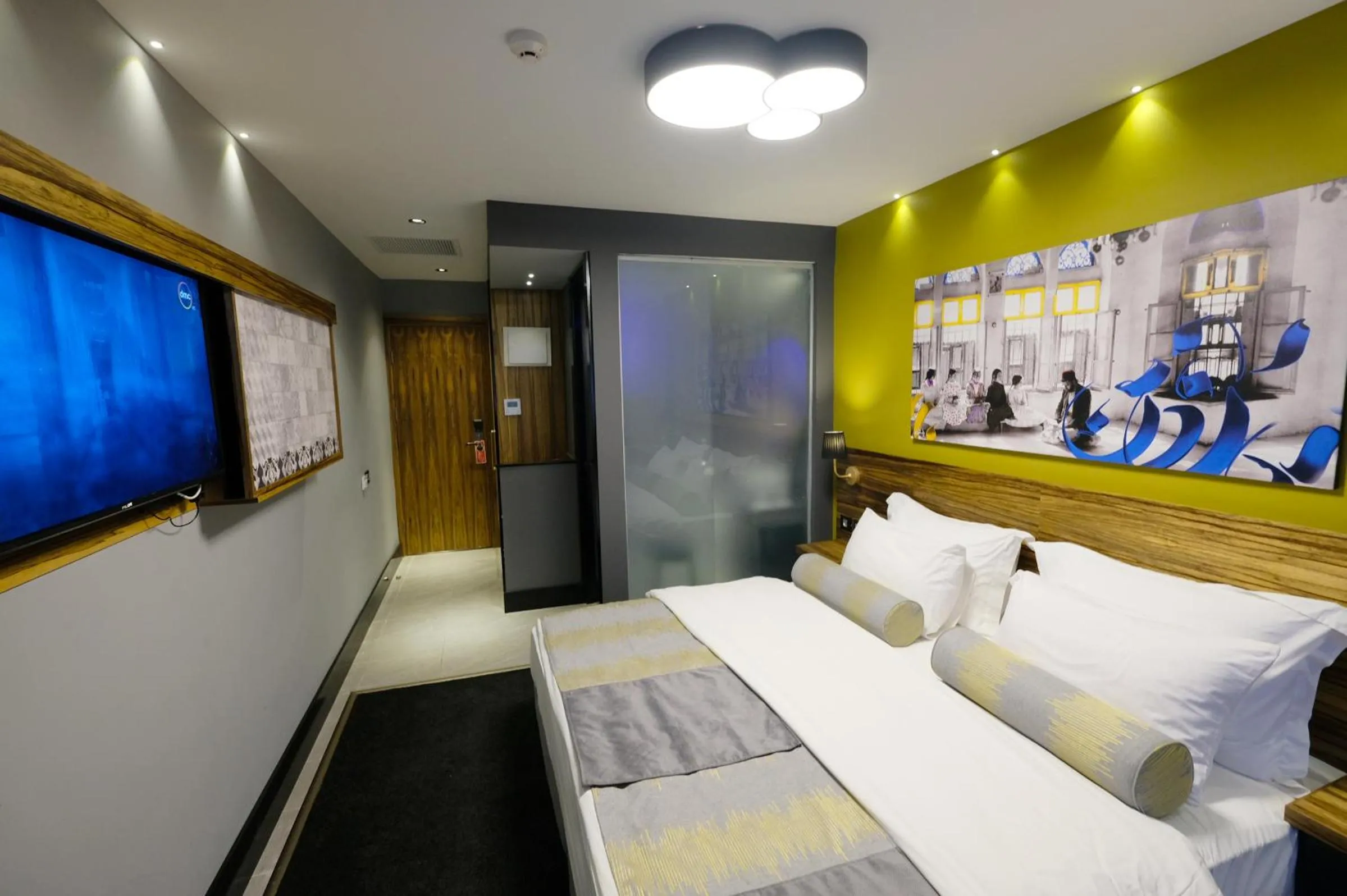 Bed in Royal Court Hotel