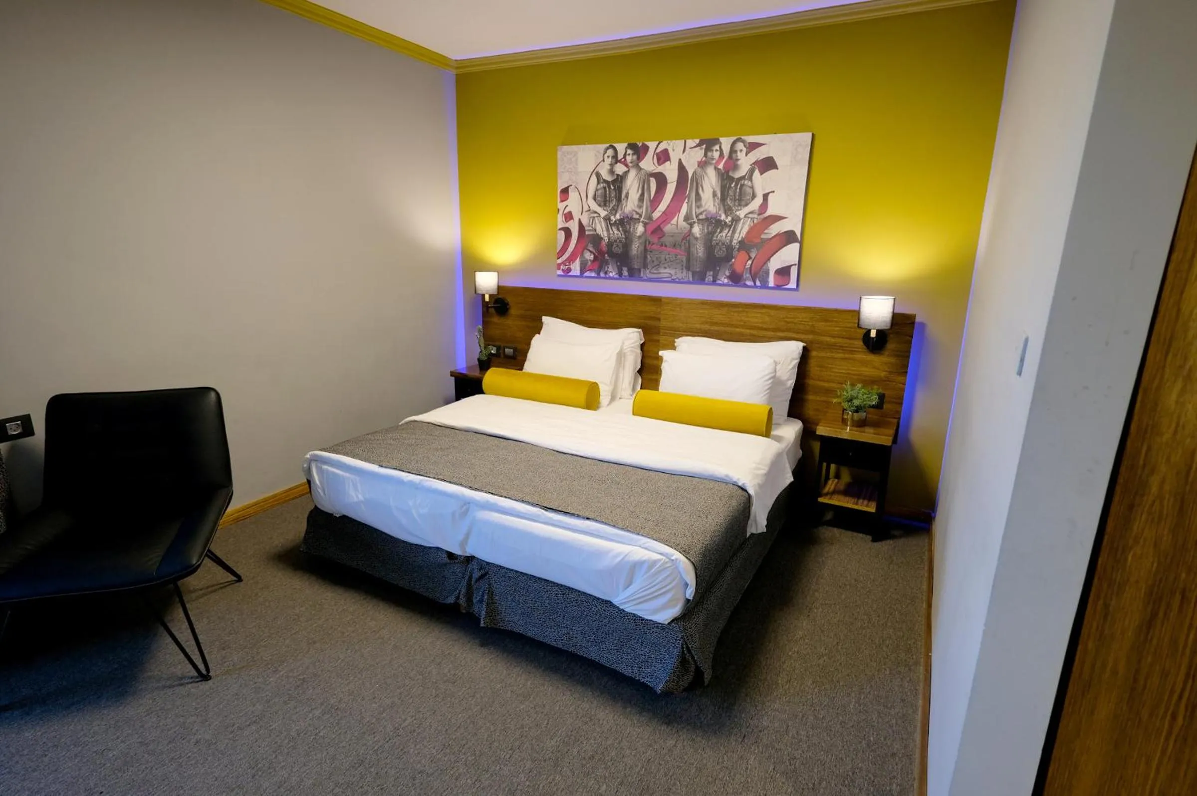 Bed in Royal Court Hotel