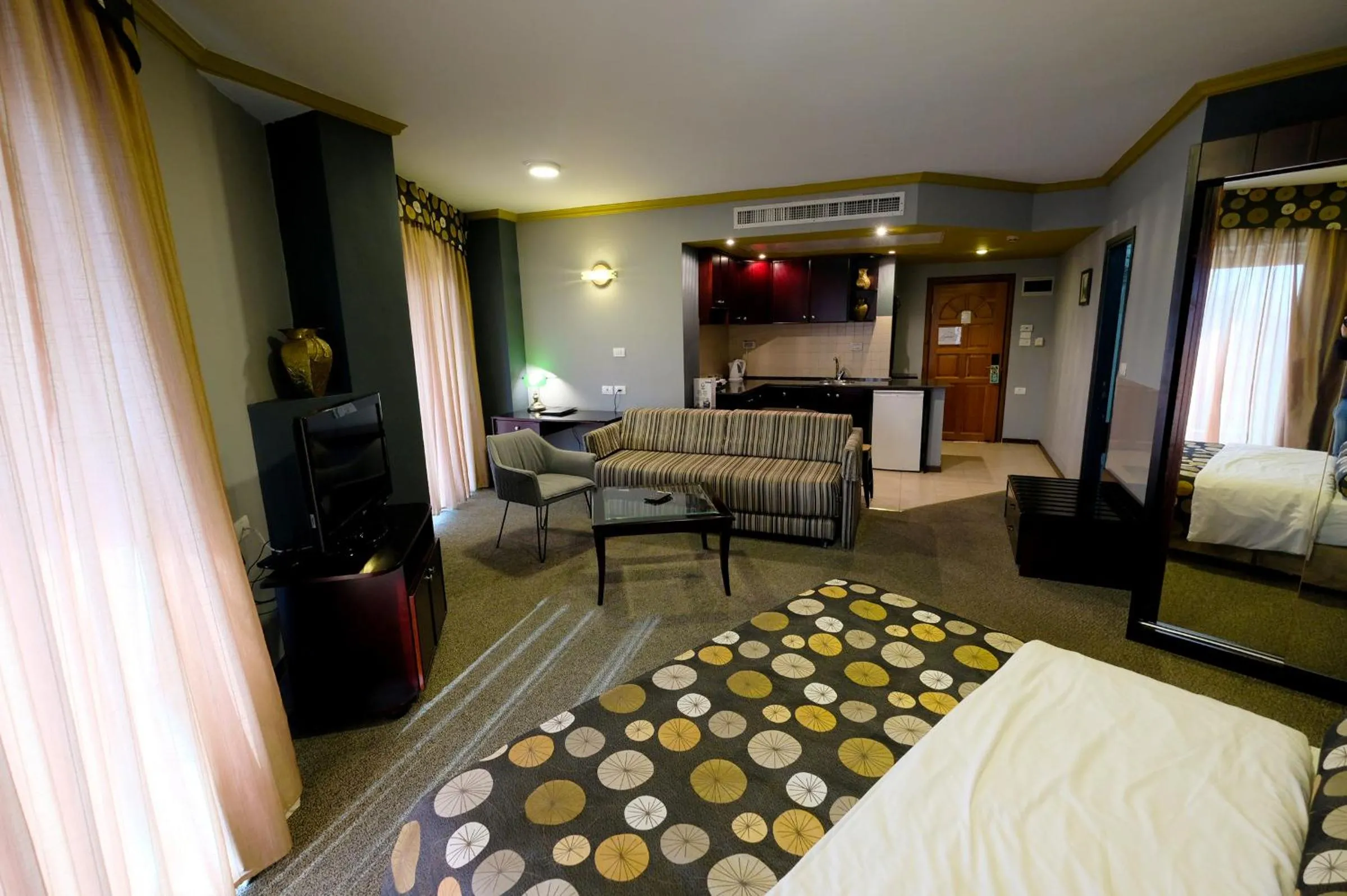 Bed in Royal Court Hotel