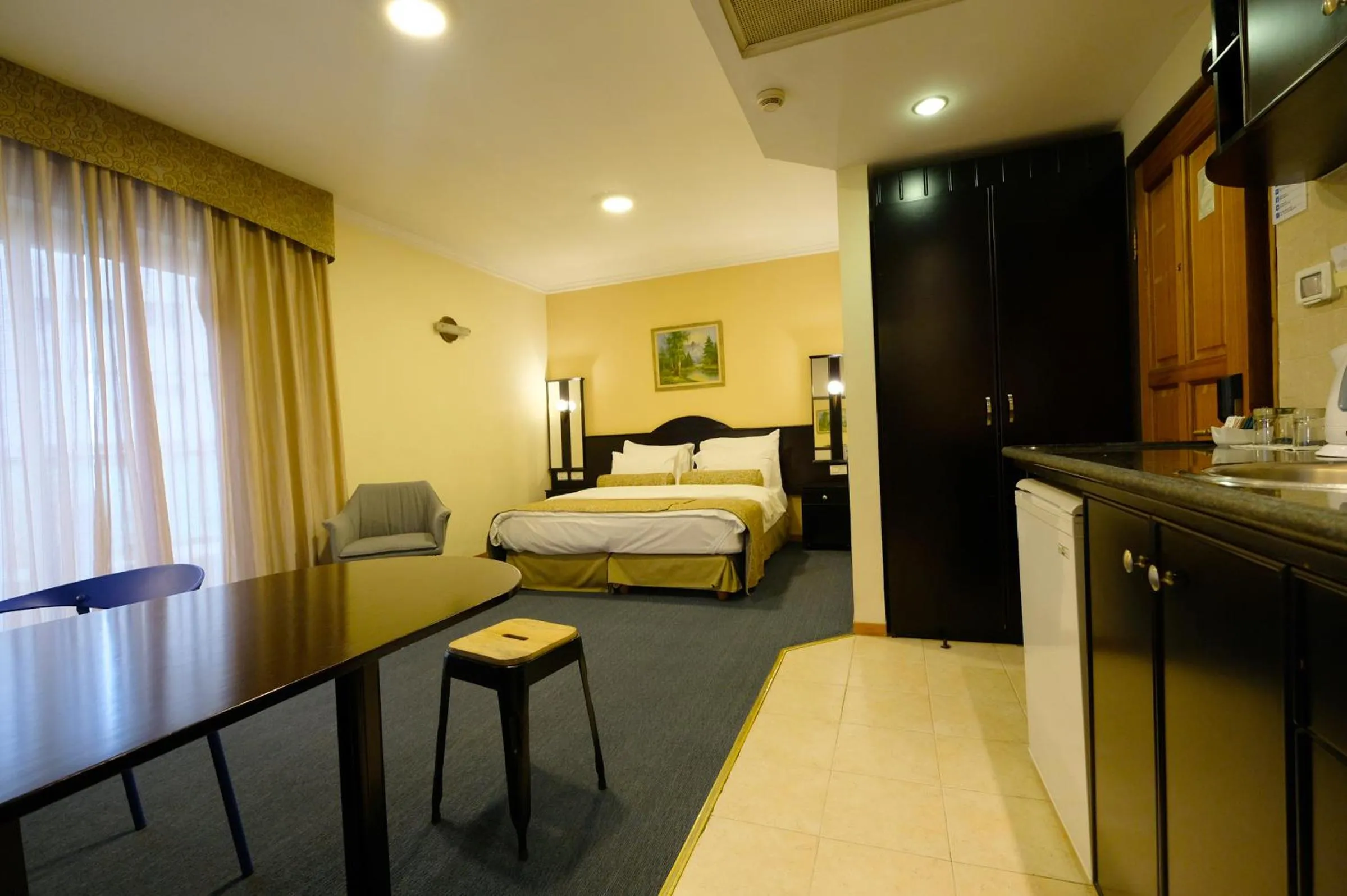 Bed in Royal Court Hotel