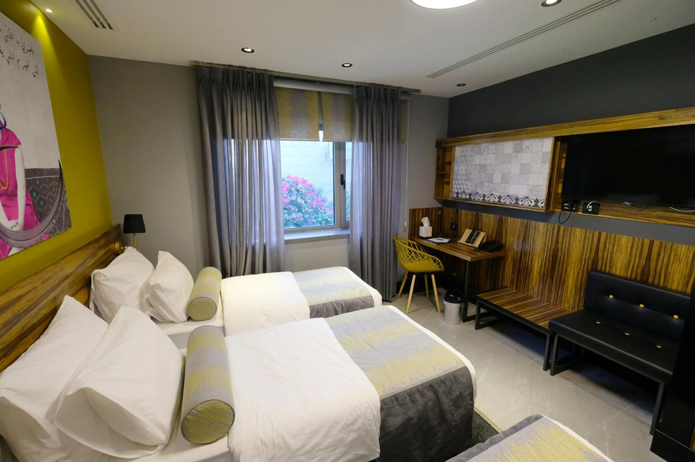 Bed in Royal Court Hotel