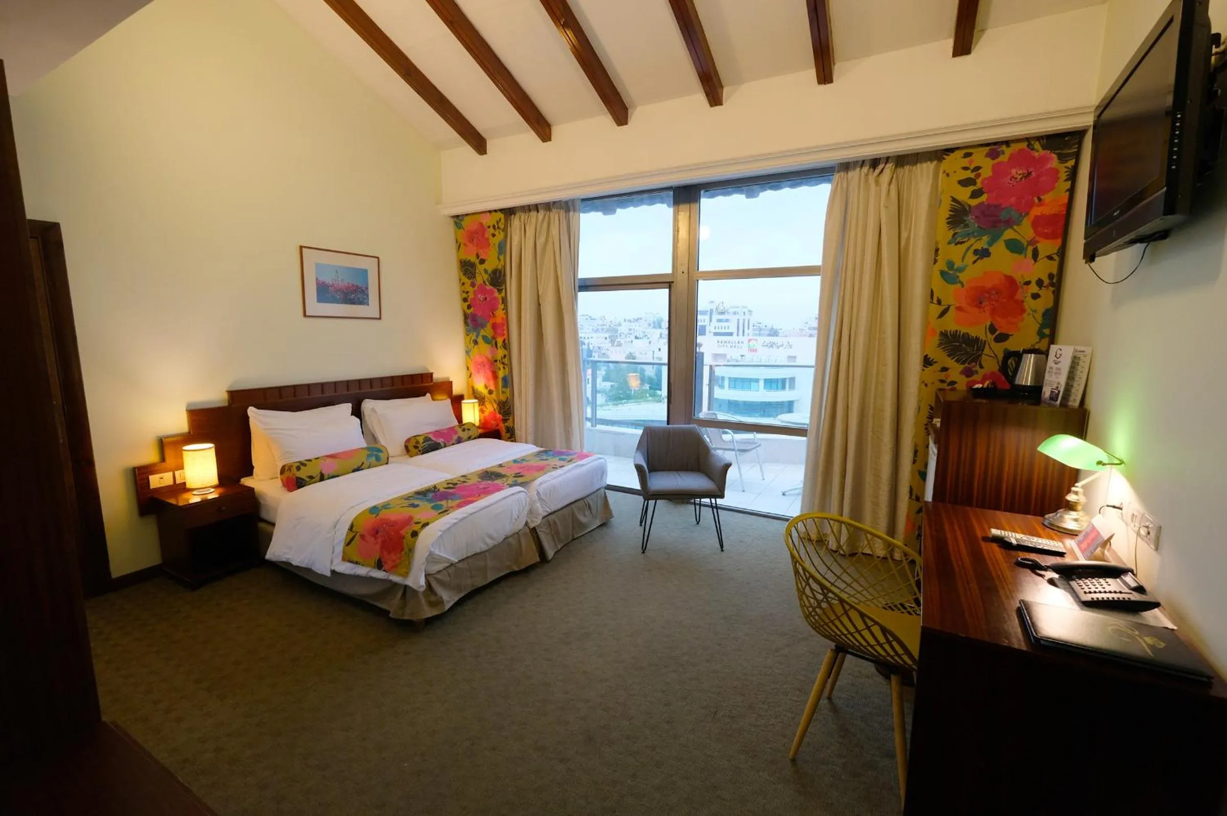 Bed in Royal Court Hotel