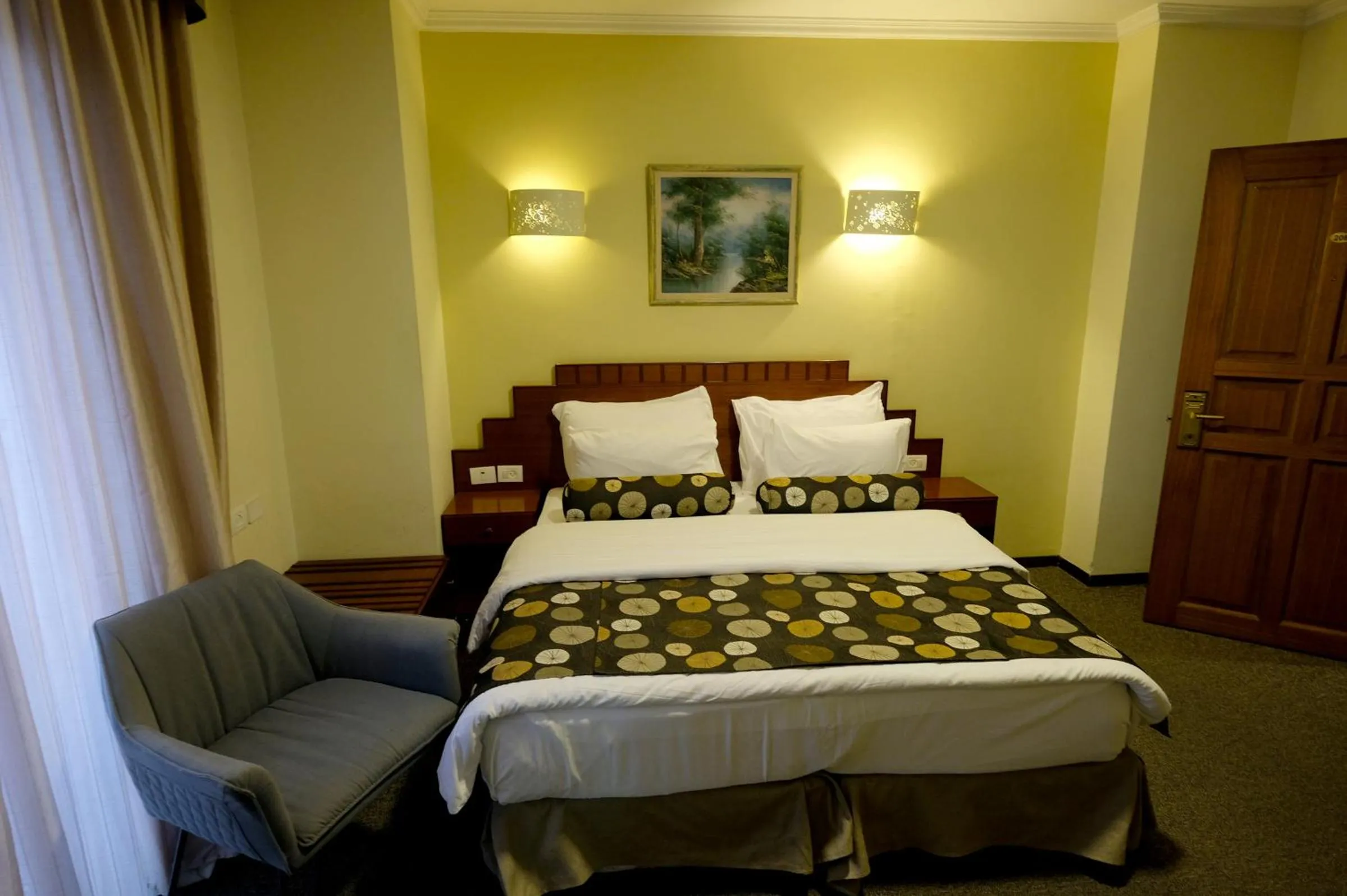 Bed in Royal Court Hotel