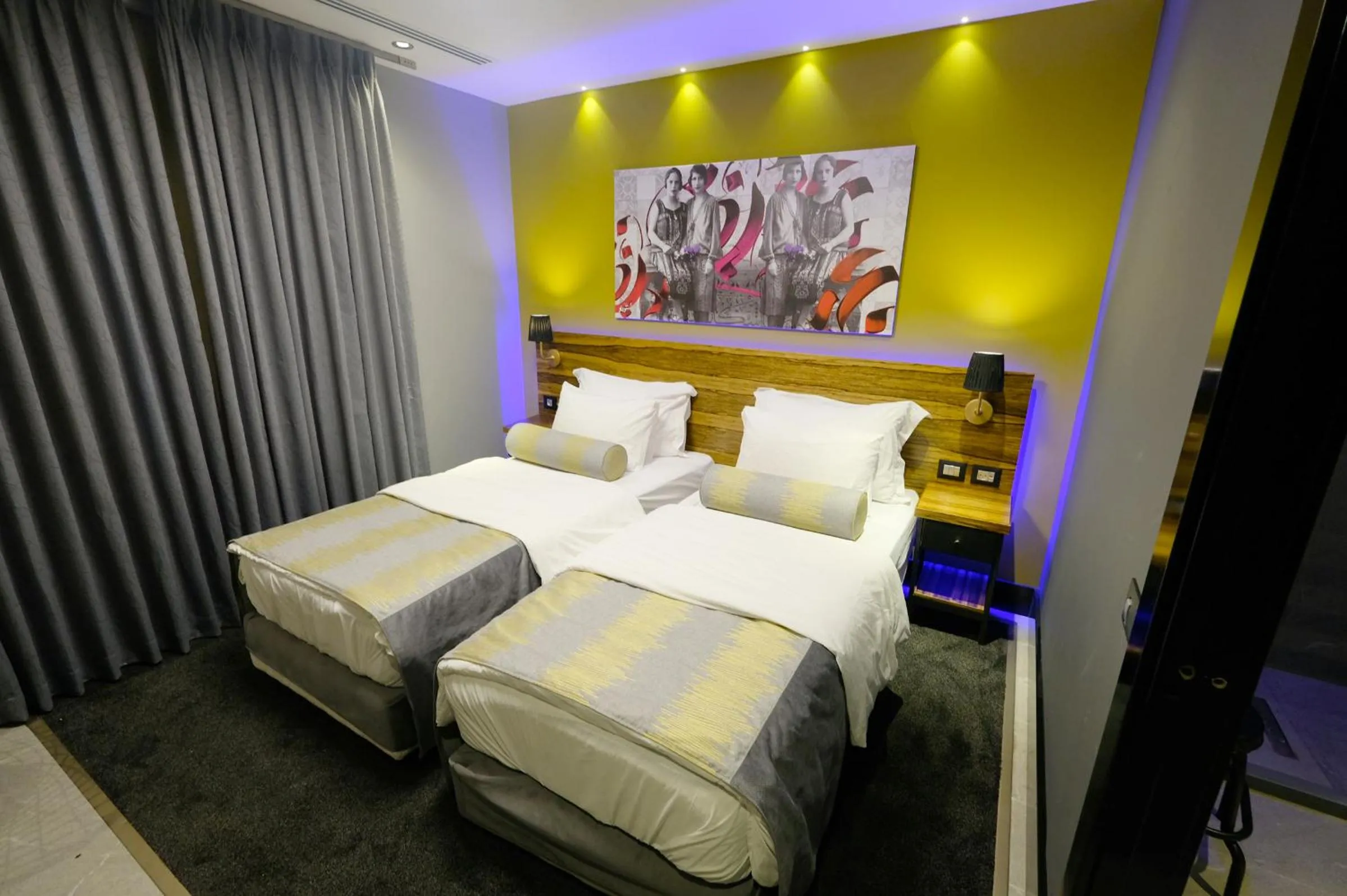 Bed in Royal Court Hotel