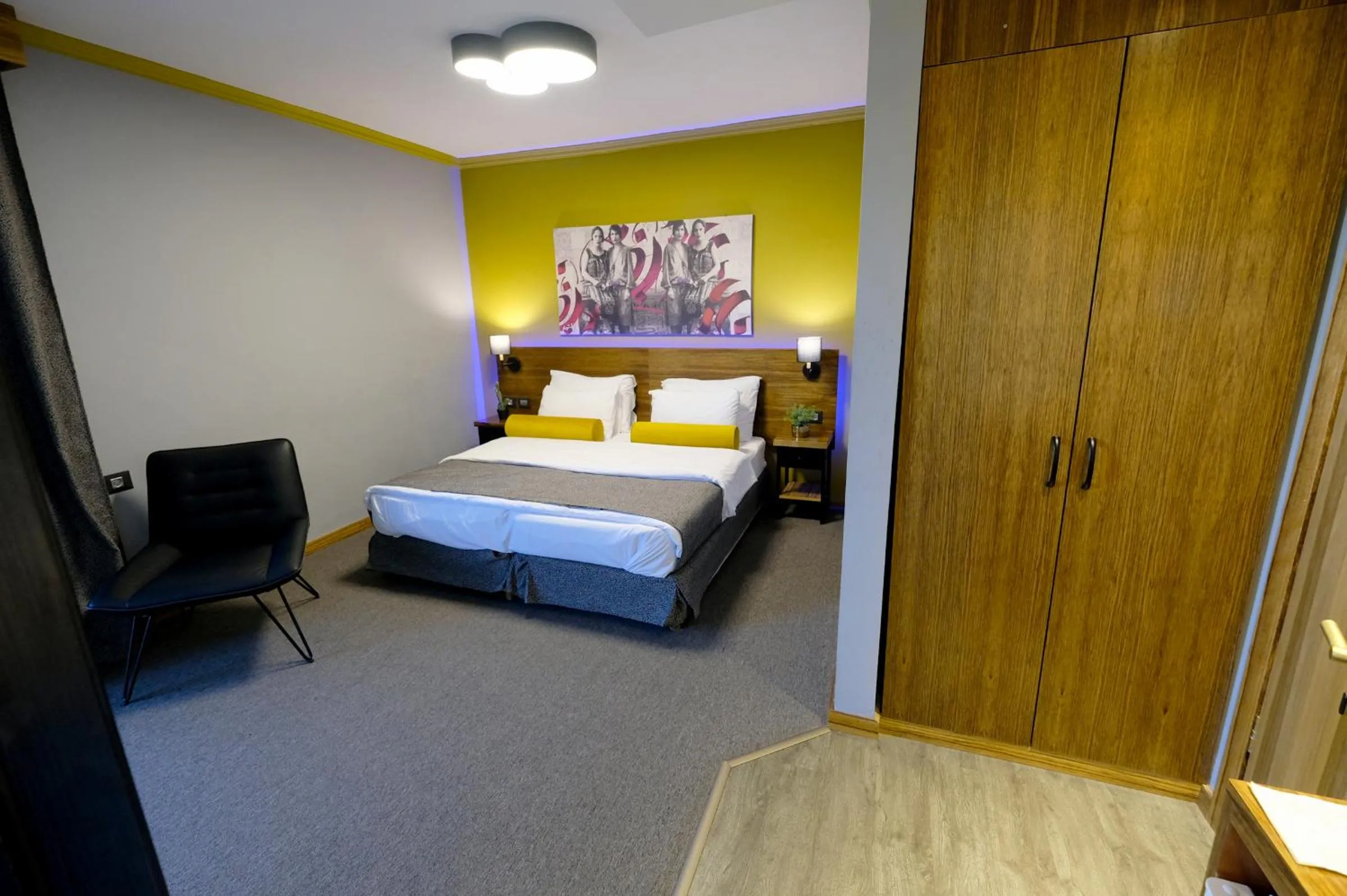 Bed in Royal Court Hotel