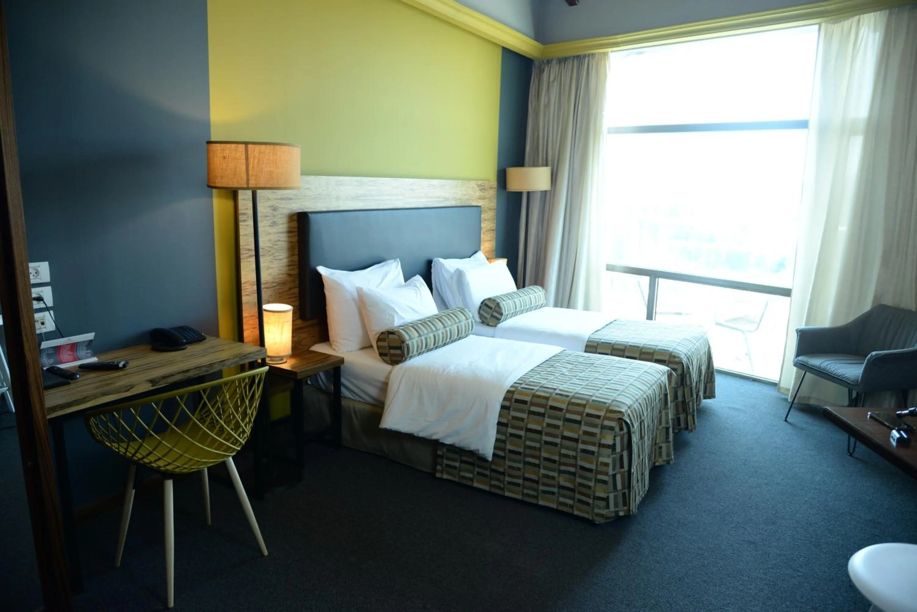 Bed in Royal Court Hotel