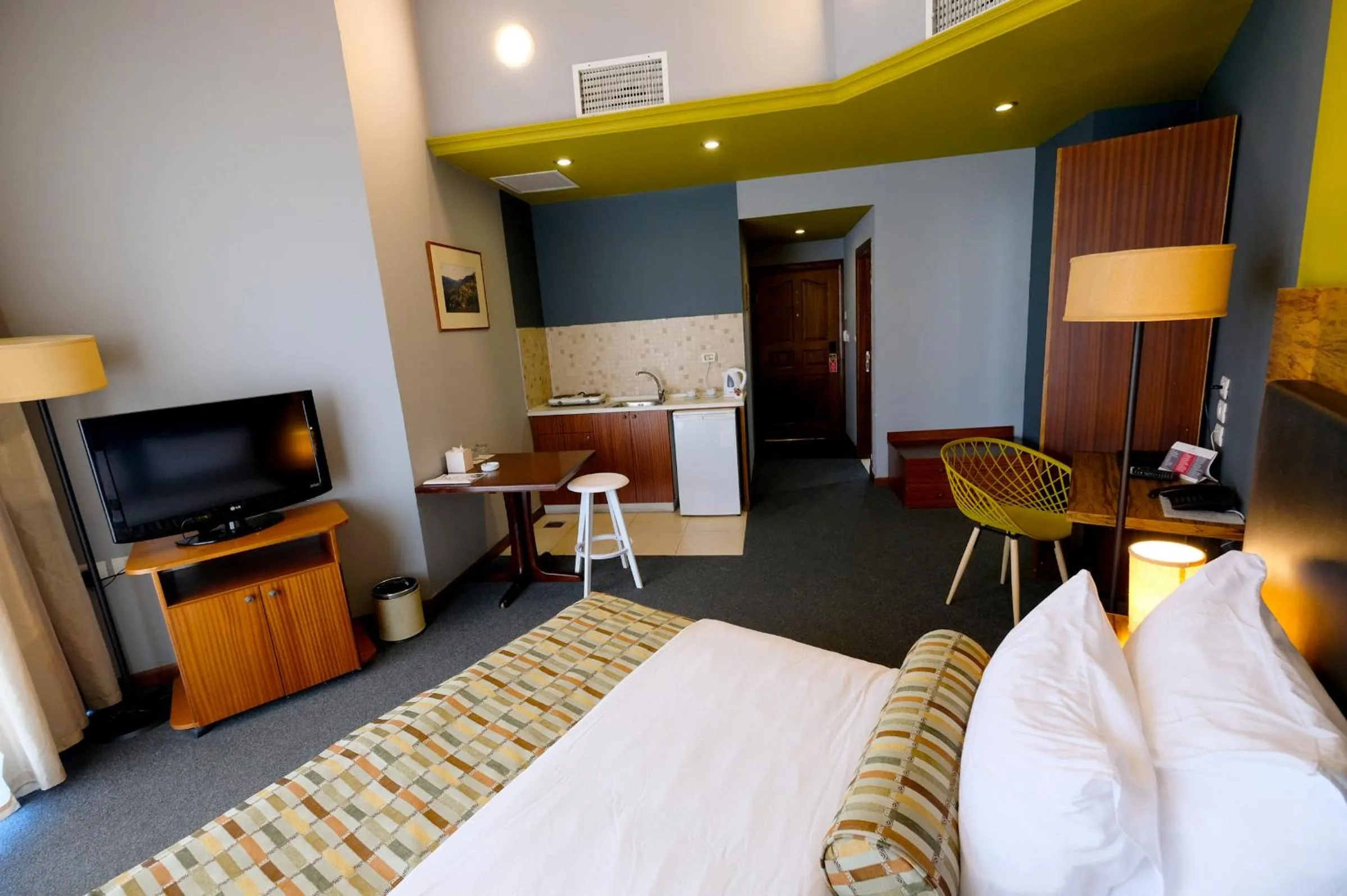 Bed in Royal Court Hotel