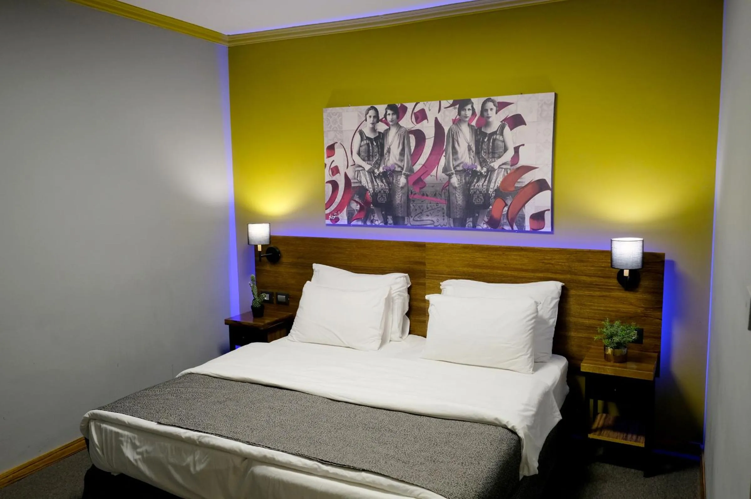 Bed in Royal Court Hotel