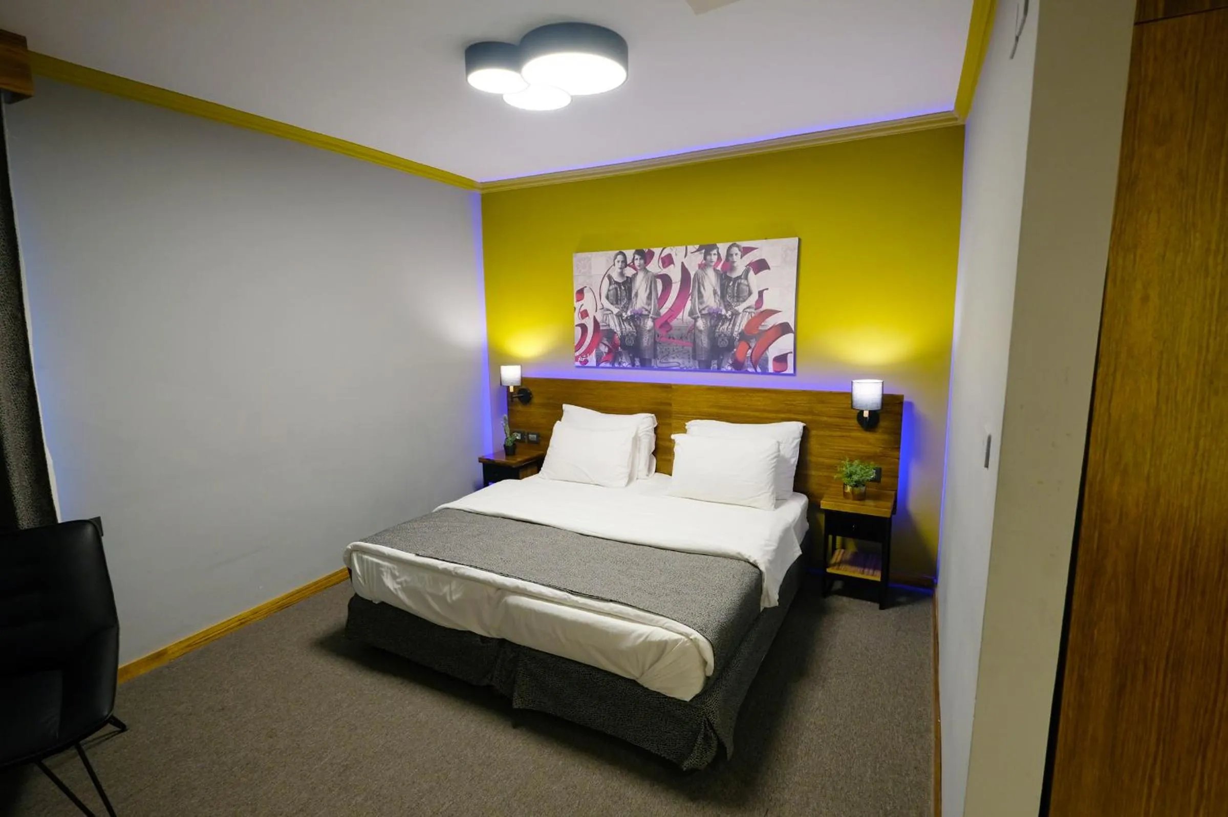 Bed in Royal Court Hotel