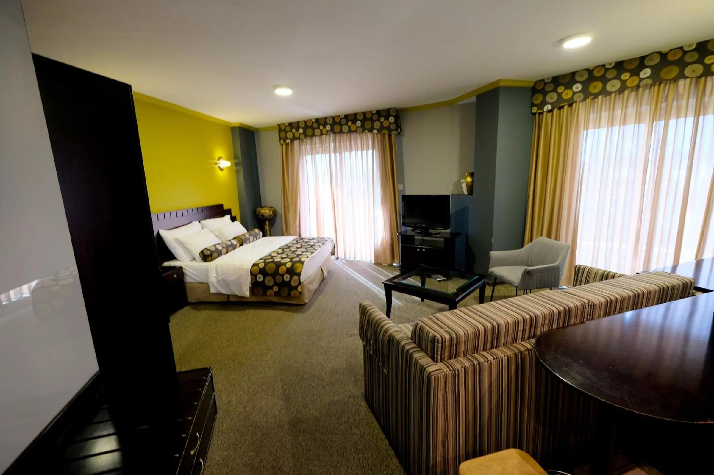 Bed in Royal Court Hotel