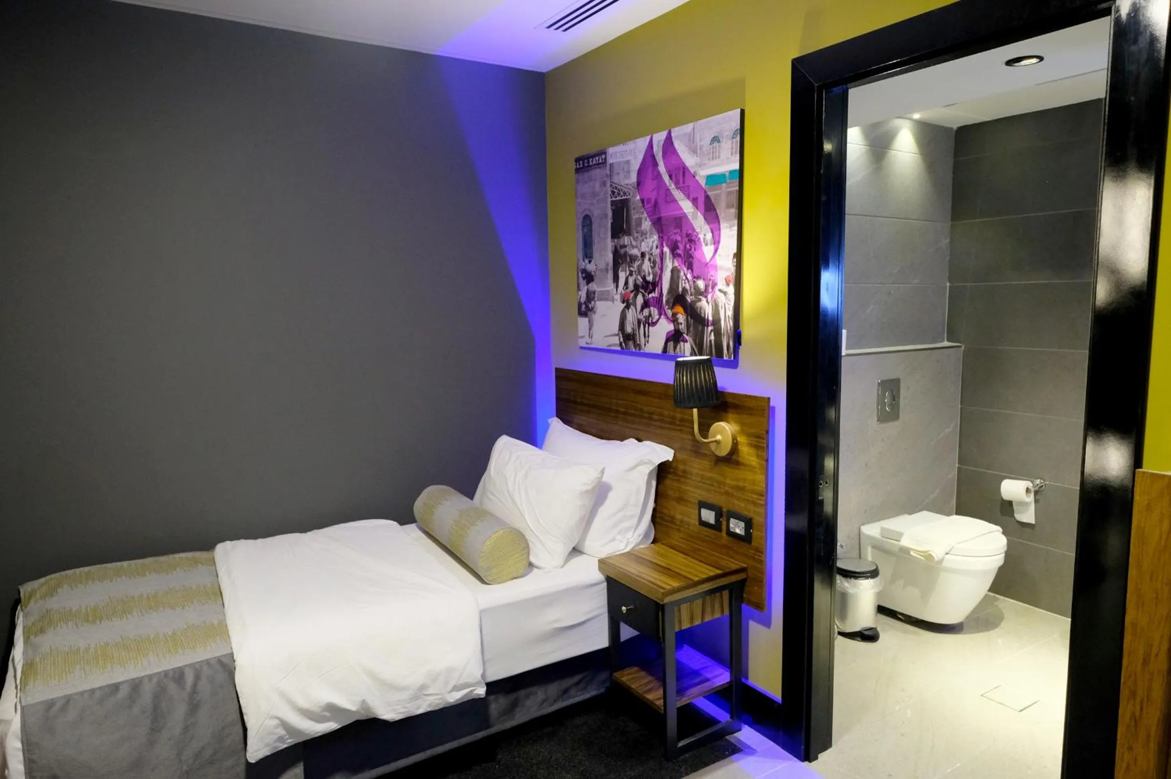 Bed in Royal Court Hotel