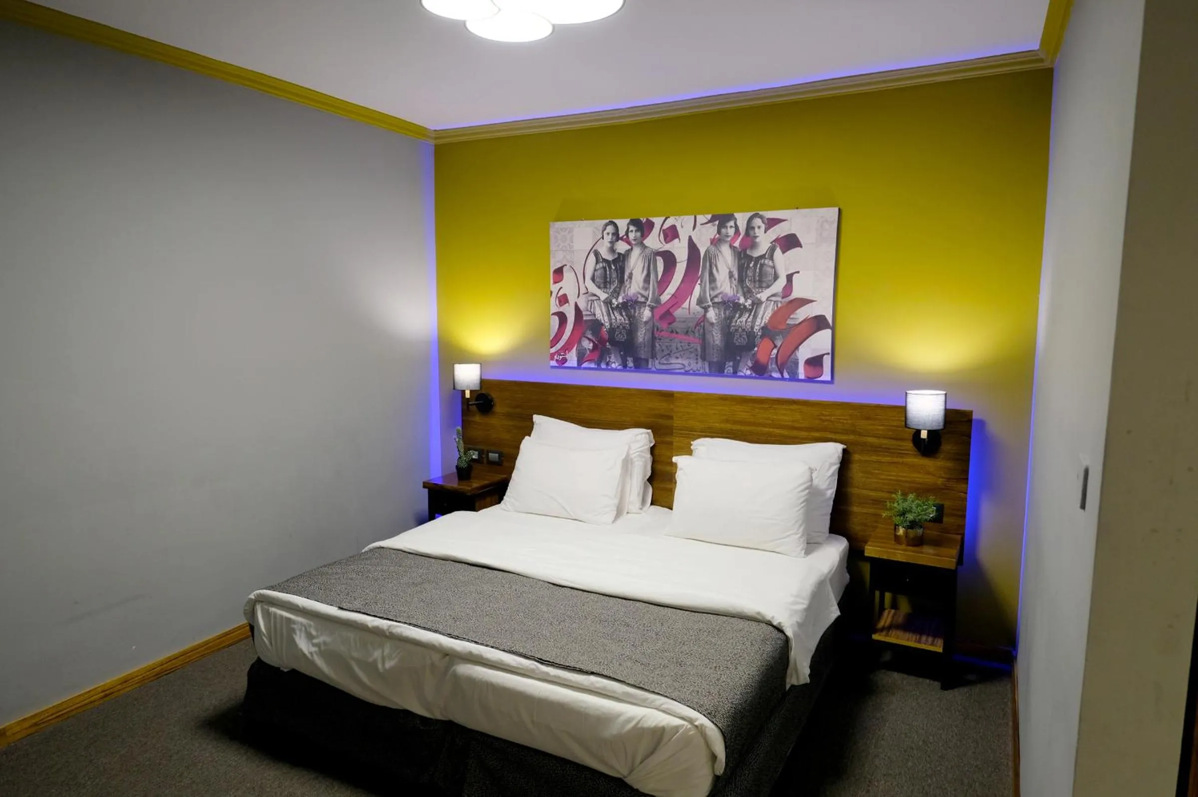 Bed in Royal Court Hotel