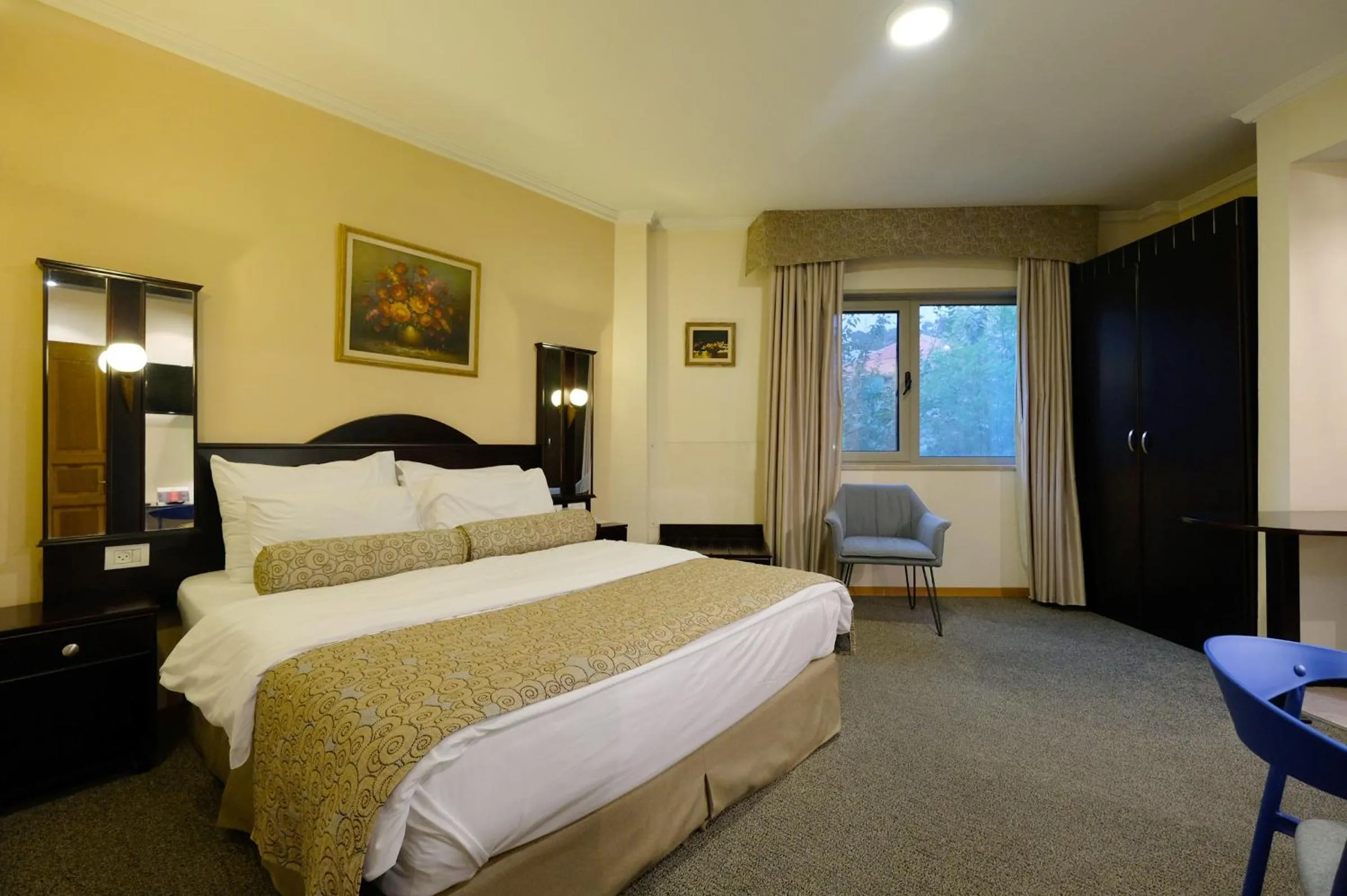 Bed in Royal Court Hotel