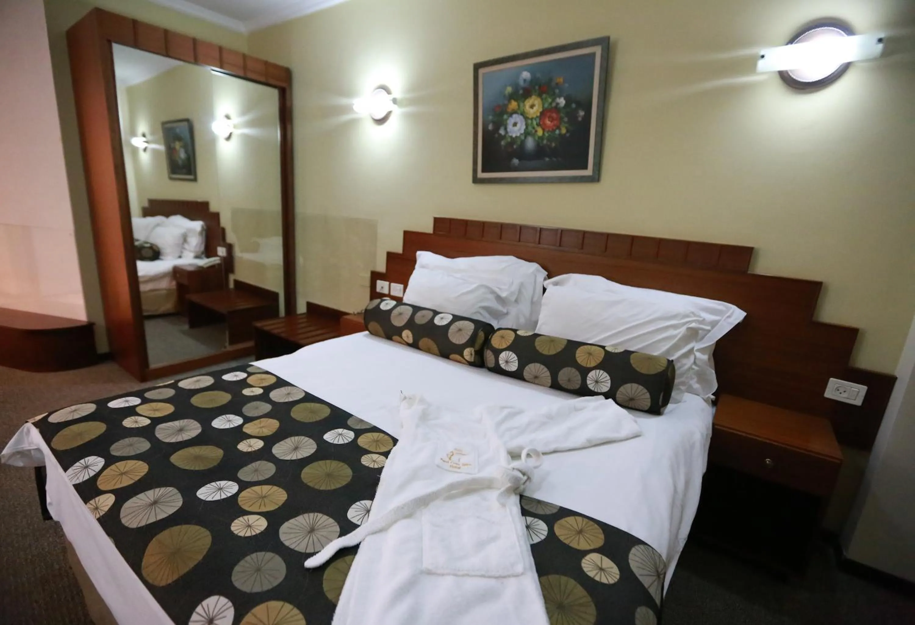 Bed in Royal Court Hotel