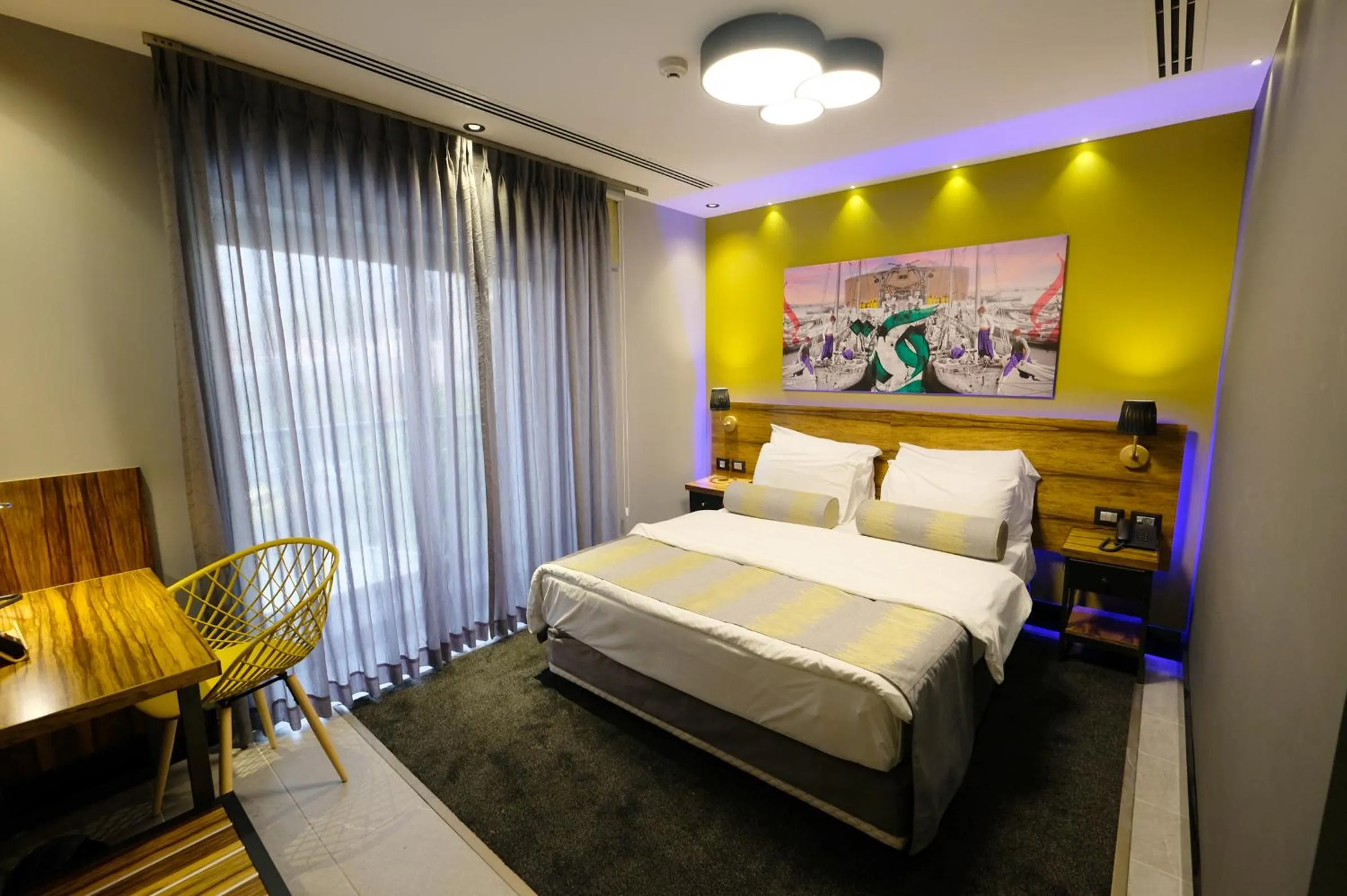 Bed in Royal Court Hotel
