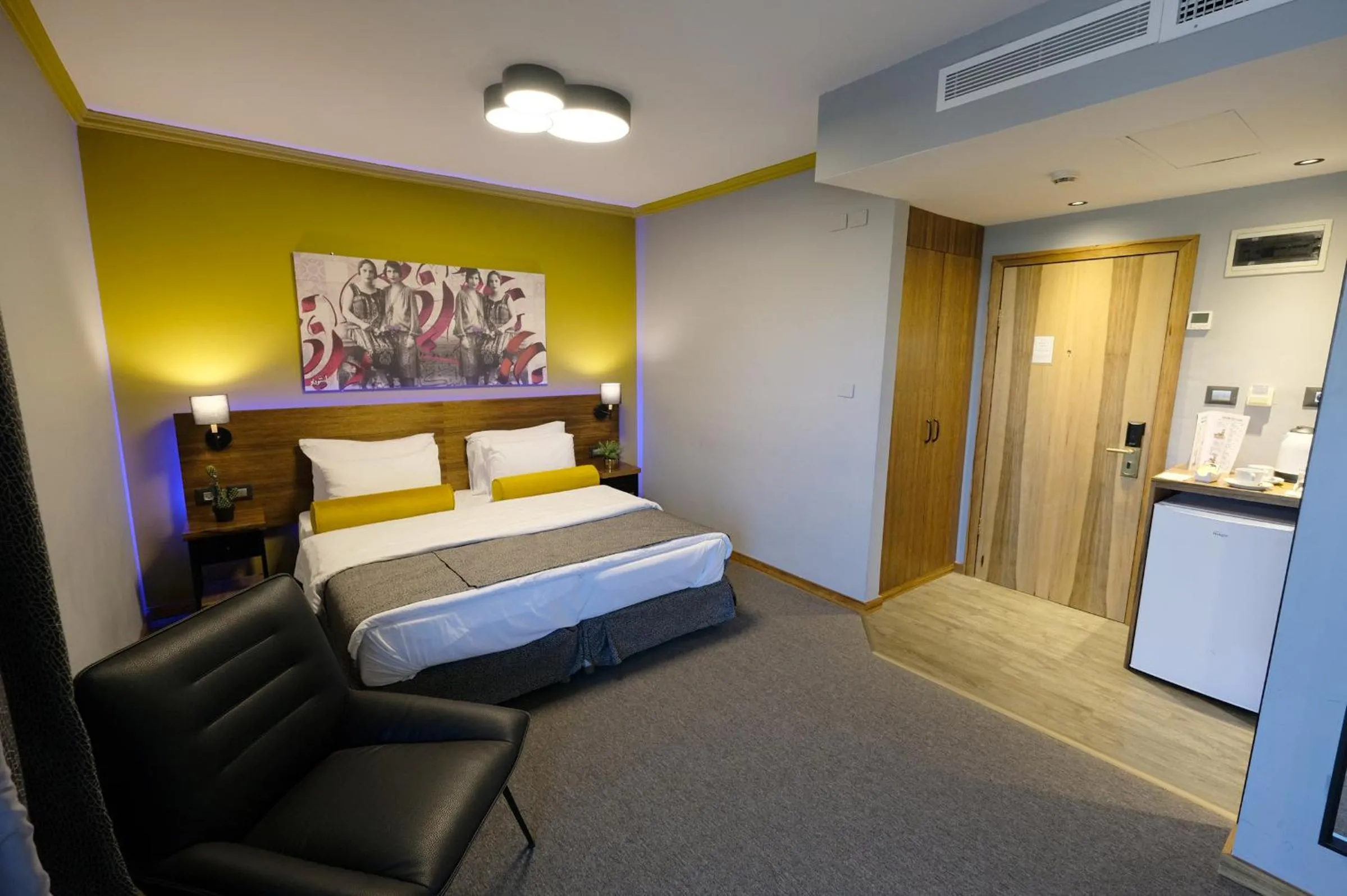 Bed in Royal Court Hotel
