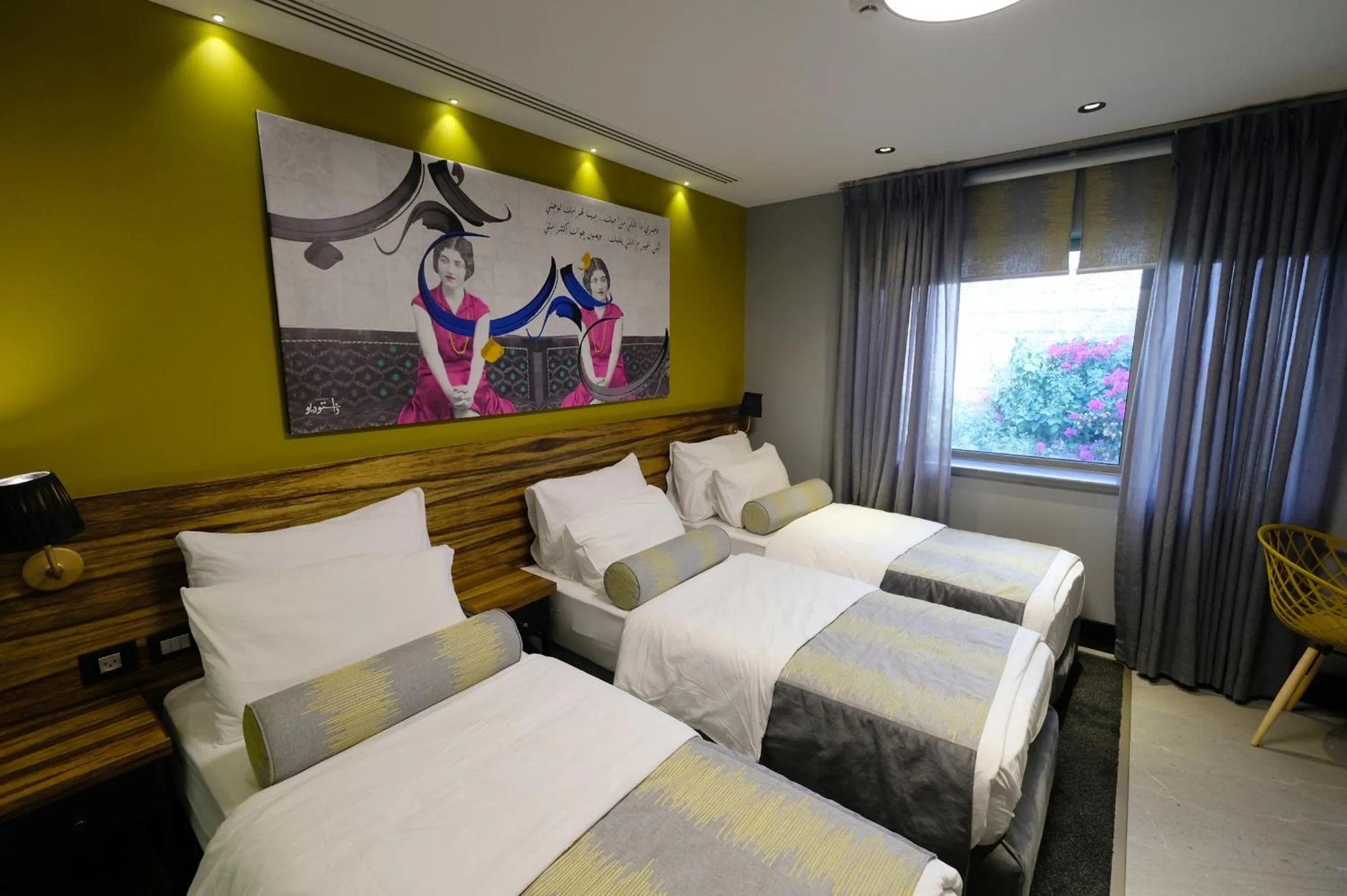 Bed in Royal Court Hotel
