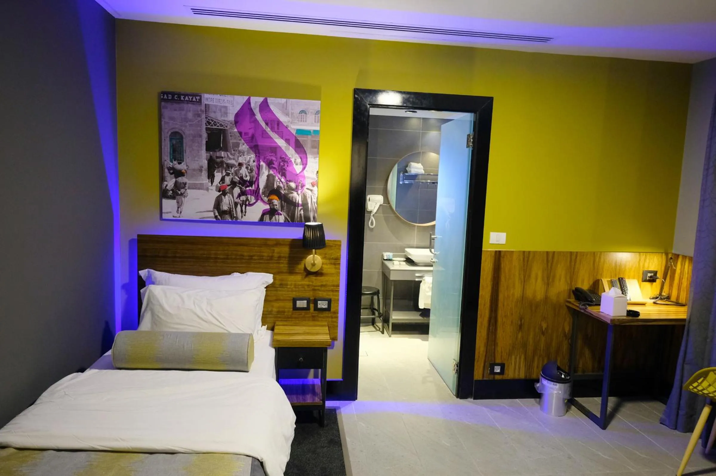 Bed in Royal Court Hotel
