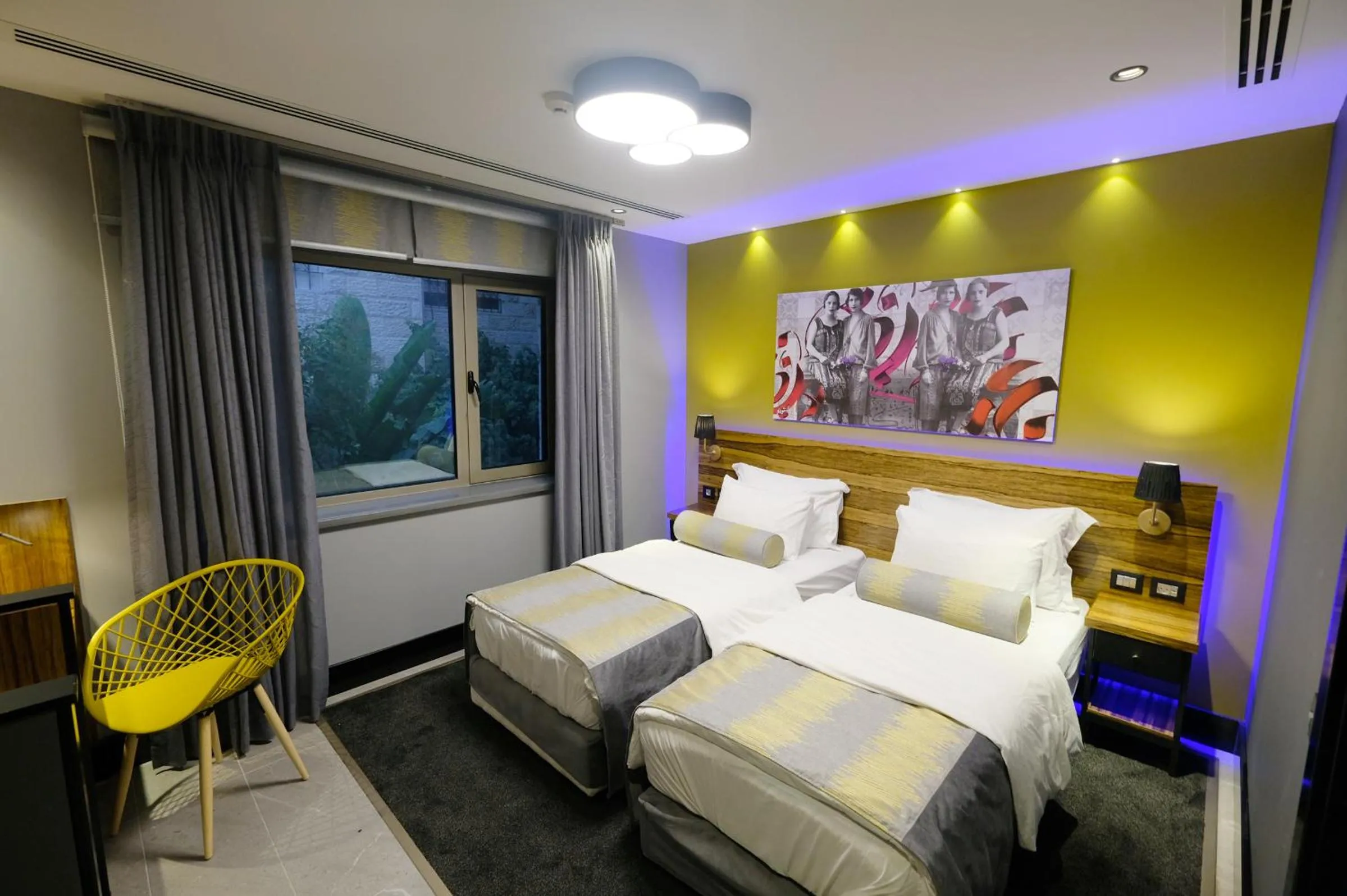 Bed in Royal Court Hotel