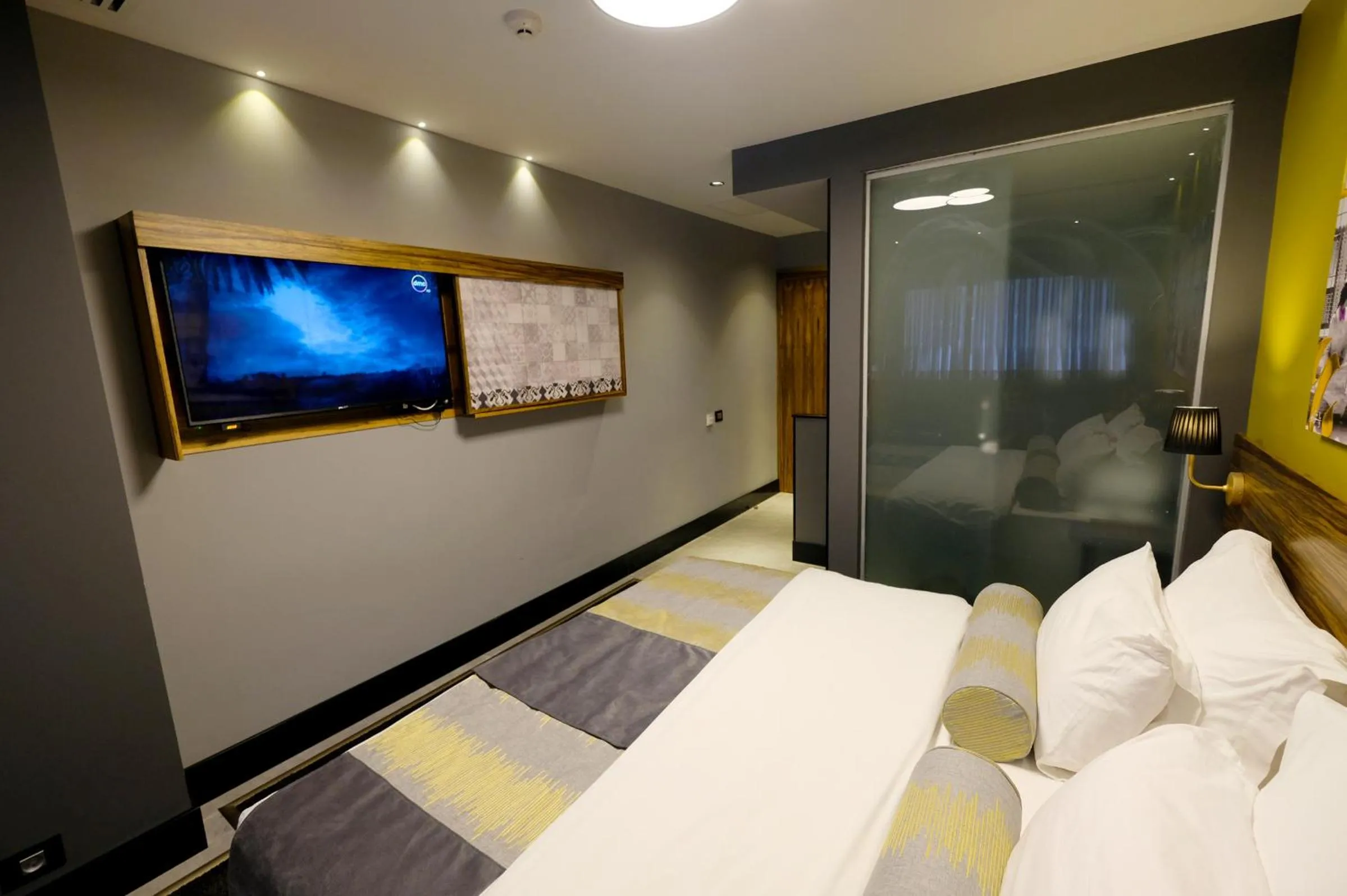 Bed in Royal Court Hotel