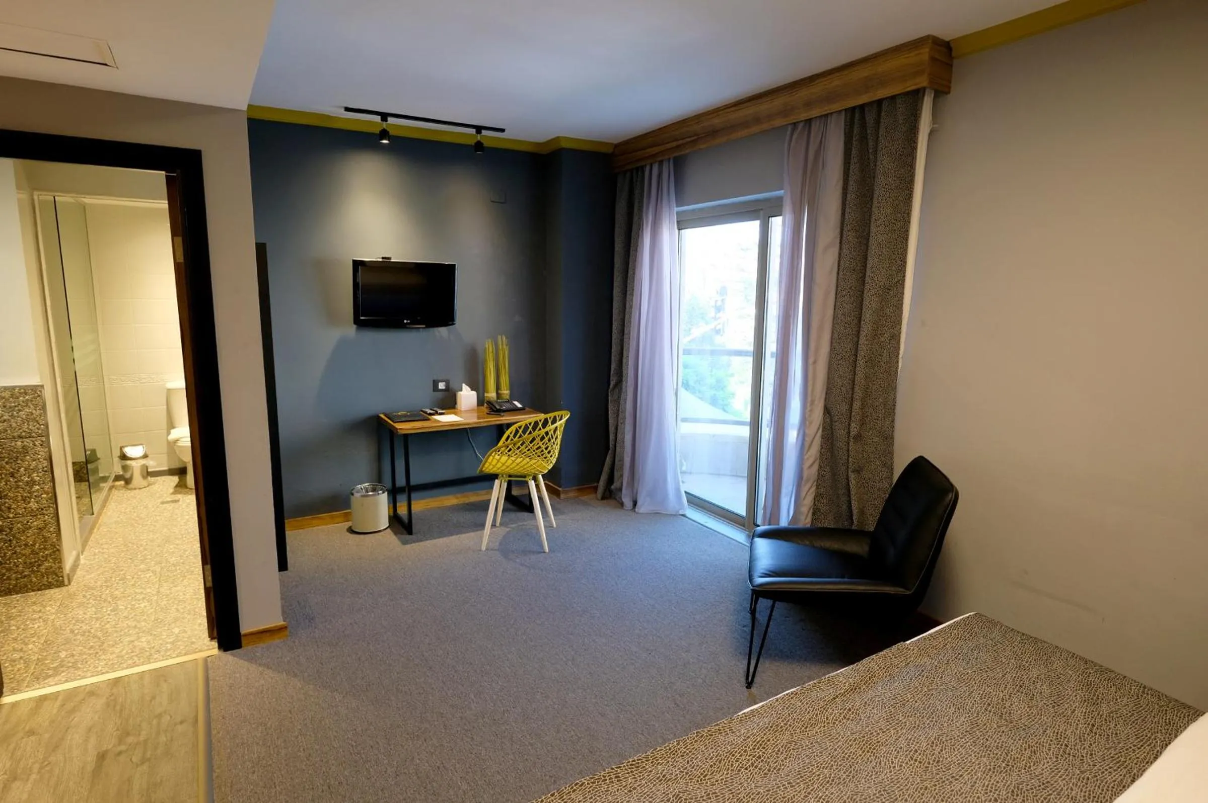Bed in Royal Court Hotel