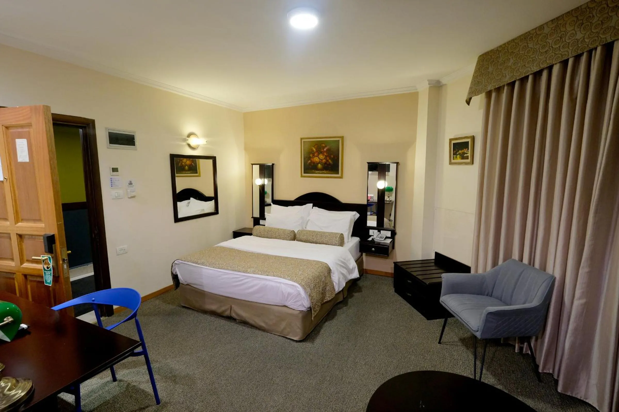 Bed in Royal Court Hotel
