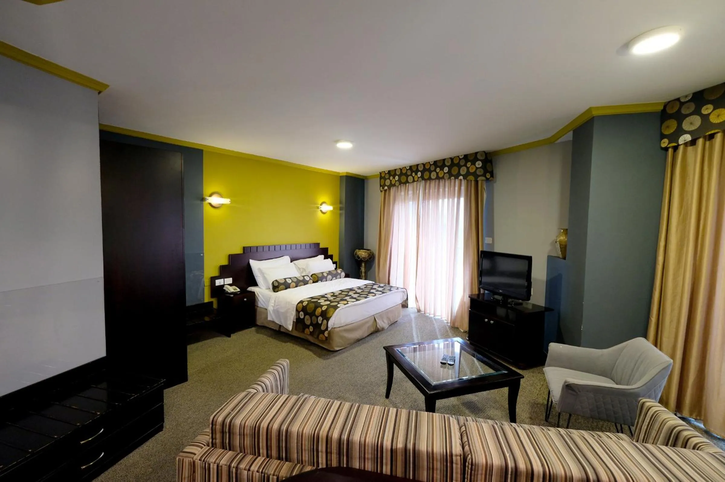 Bed in Royal Court Hotel