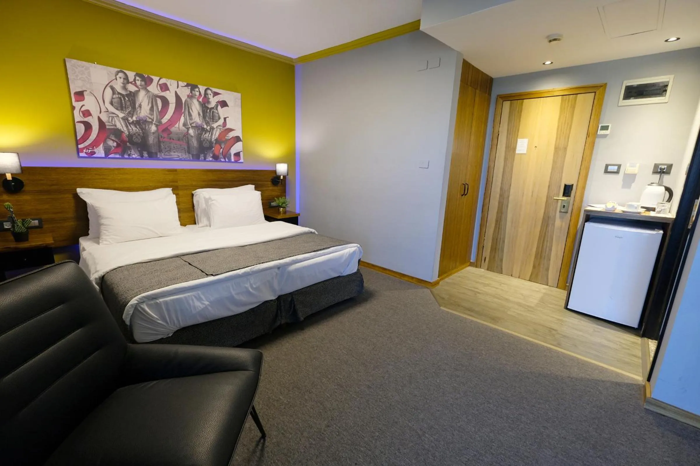 Bed in Royal Court Hotel