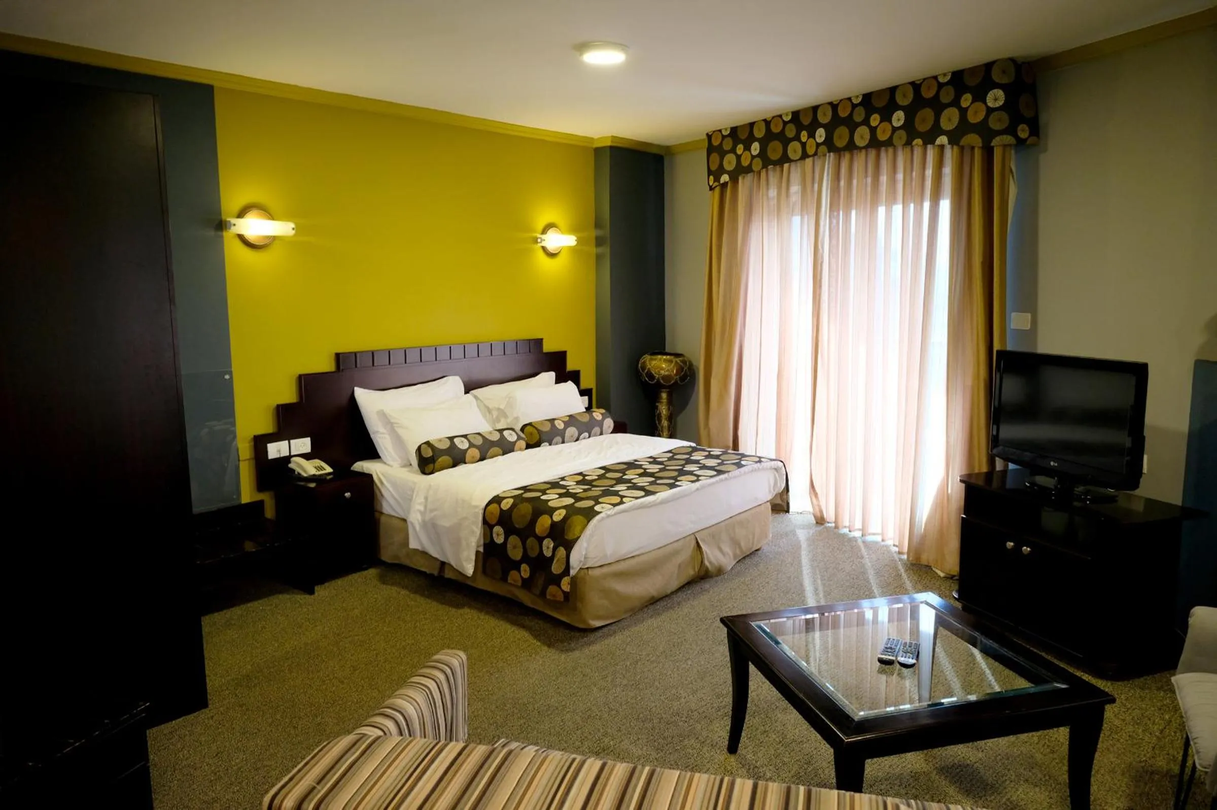 Bed in Royal Court Hotel